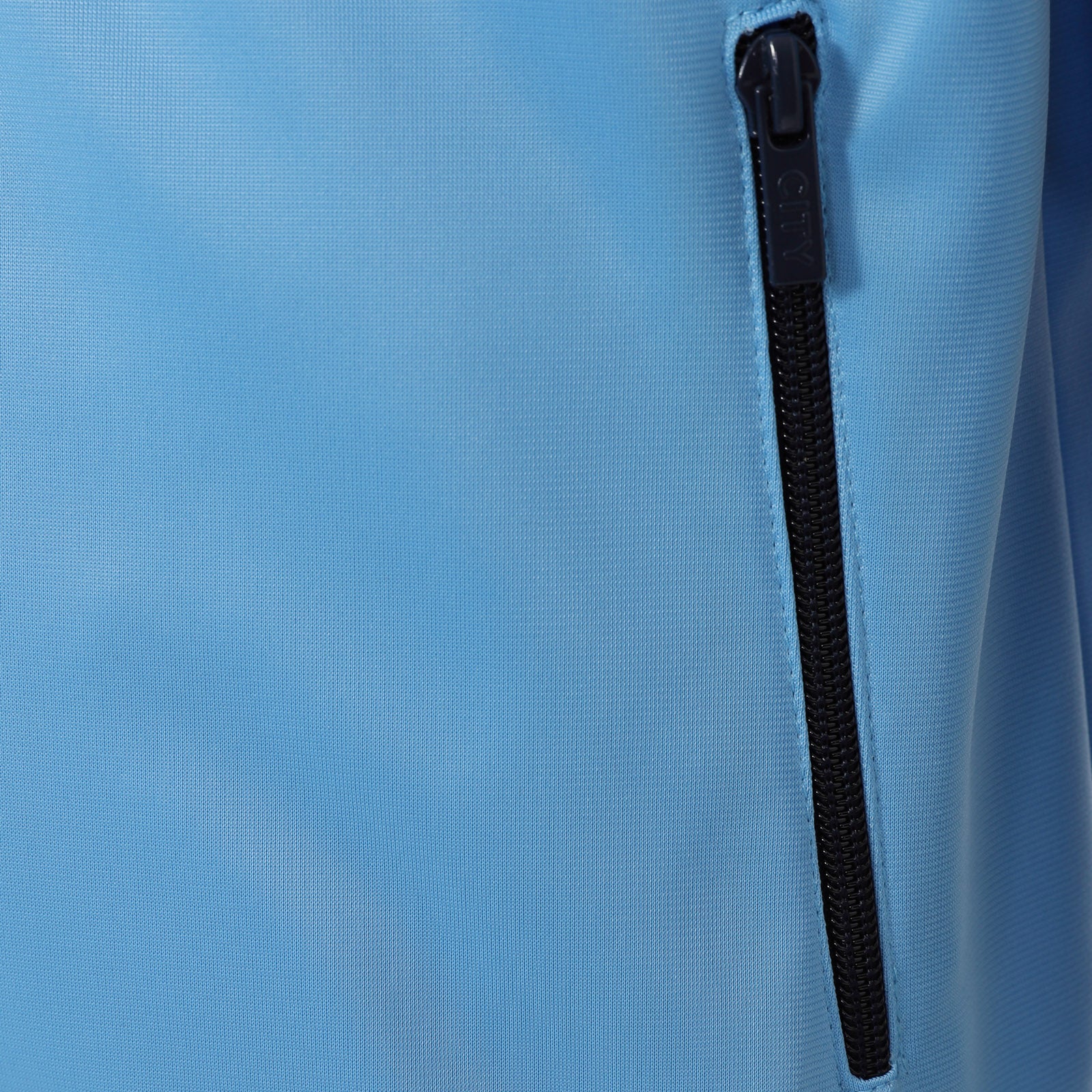 Man City kids retro track jacket in sky blue with club crest to chest.