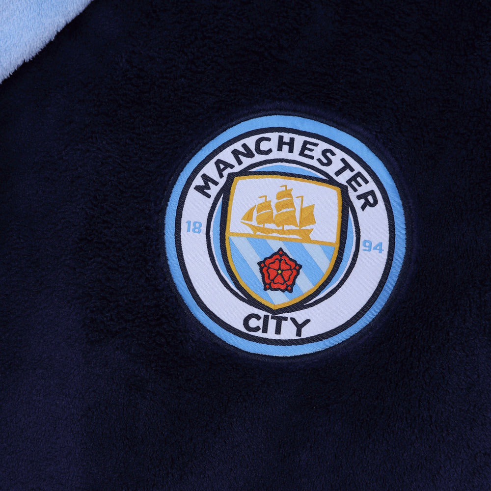 Man City adults dressing gown in navy blue with crest.