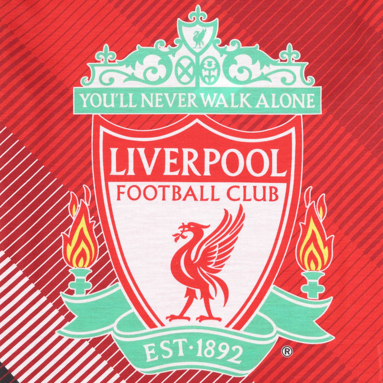 Liverpool kids long pyjamas in red. Long sleeve top with club crest. Long legged bottoms with crest.