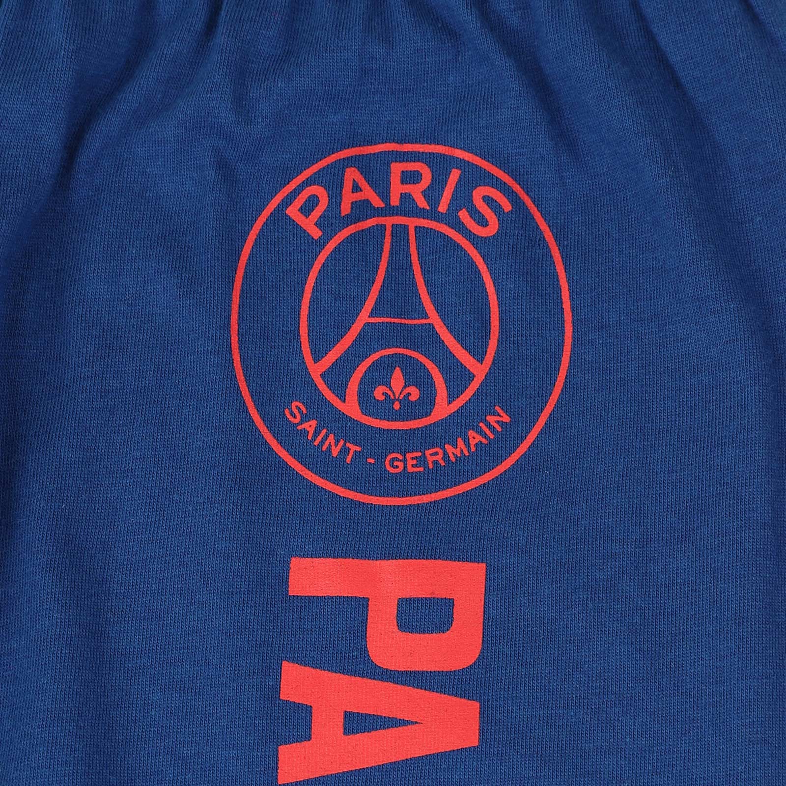PSG kids long pyjamas in blue iwith long sleeve top with graphic crest with long legged bottoms