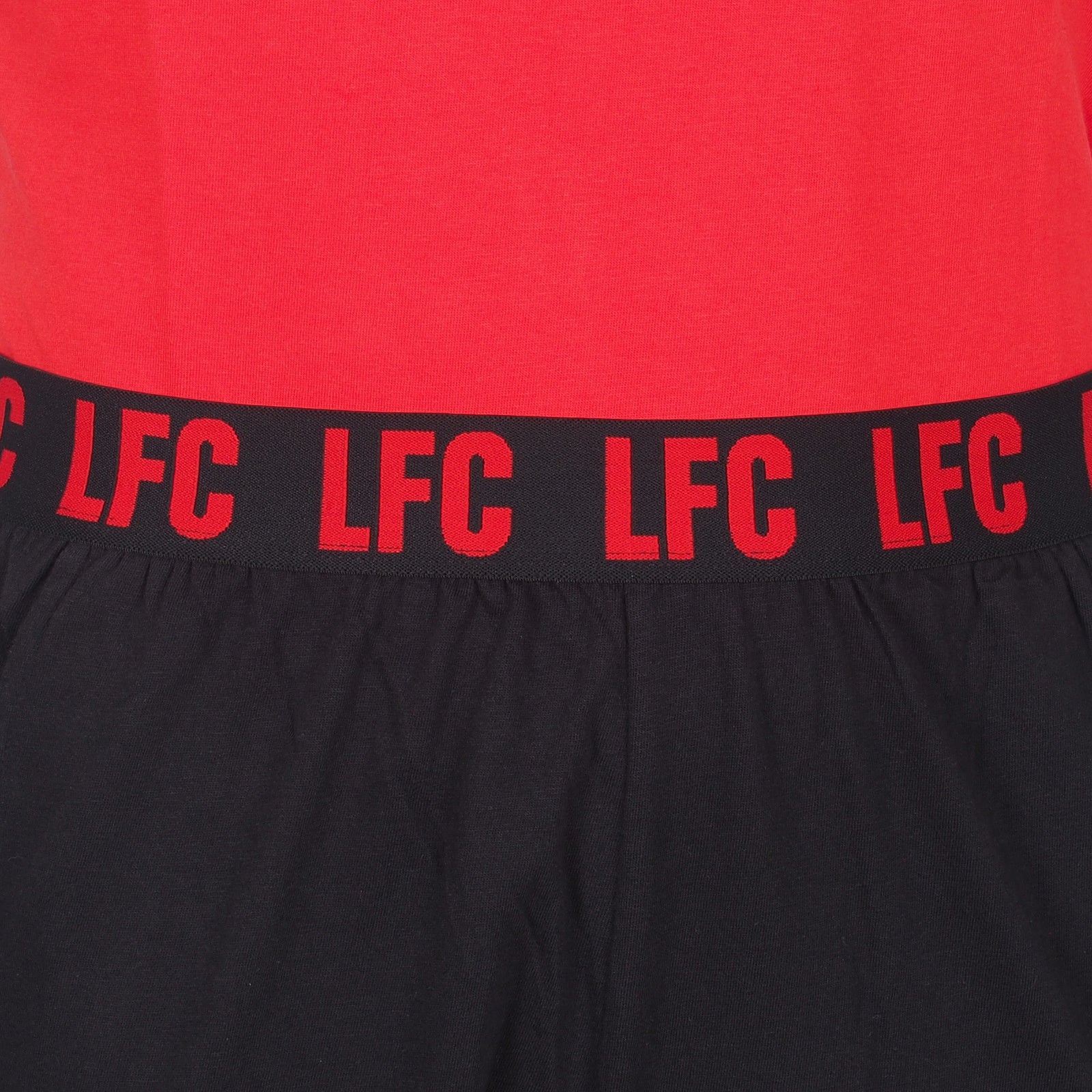 Liverpool adults long pyjamas in black & red. Two-tone short sleeve top with club crest and long bottoms with badge