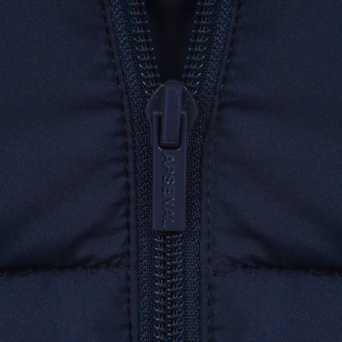Arsenal kids quilted jacket winter coat in navy with club crest to chest.