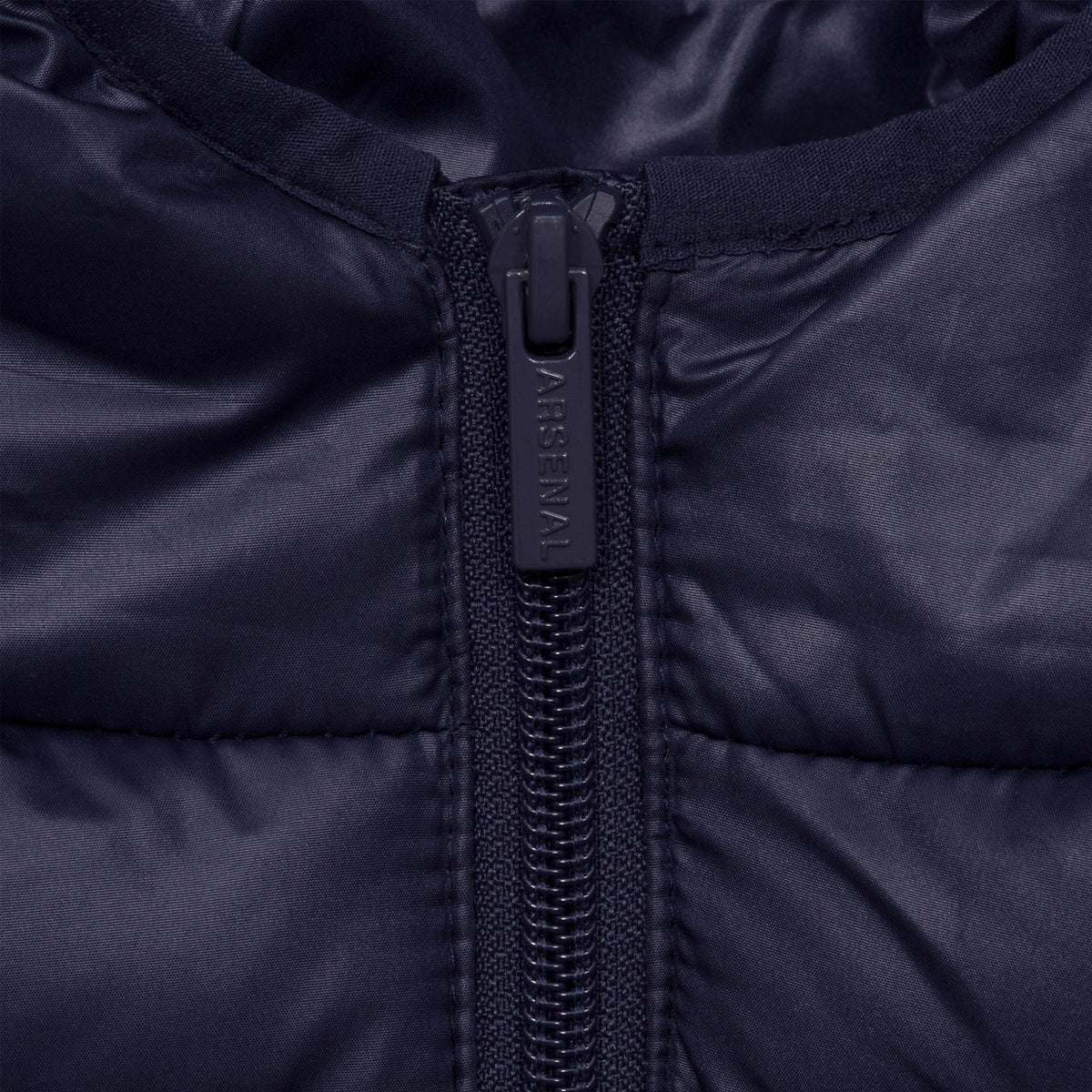 Arsenal adults quilted jacket in navy blue with club crest to chest.