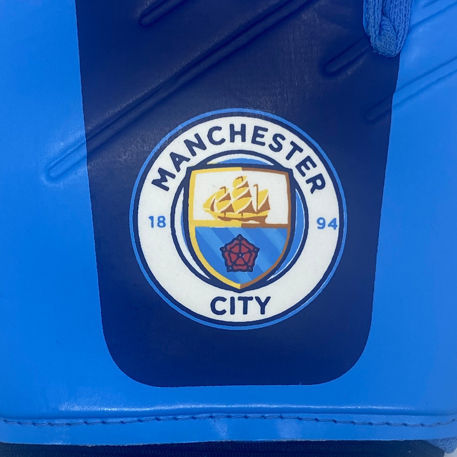 Man City blue goalkeeper gloves with MCFC crest & text print to each glove