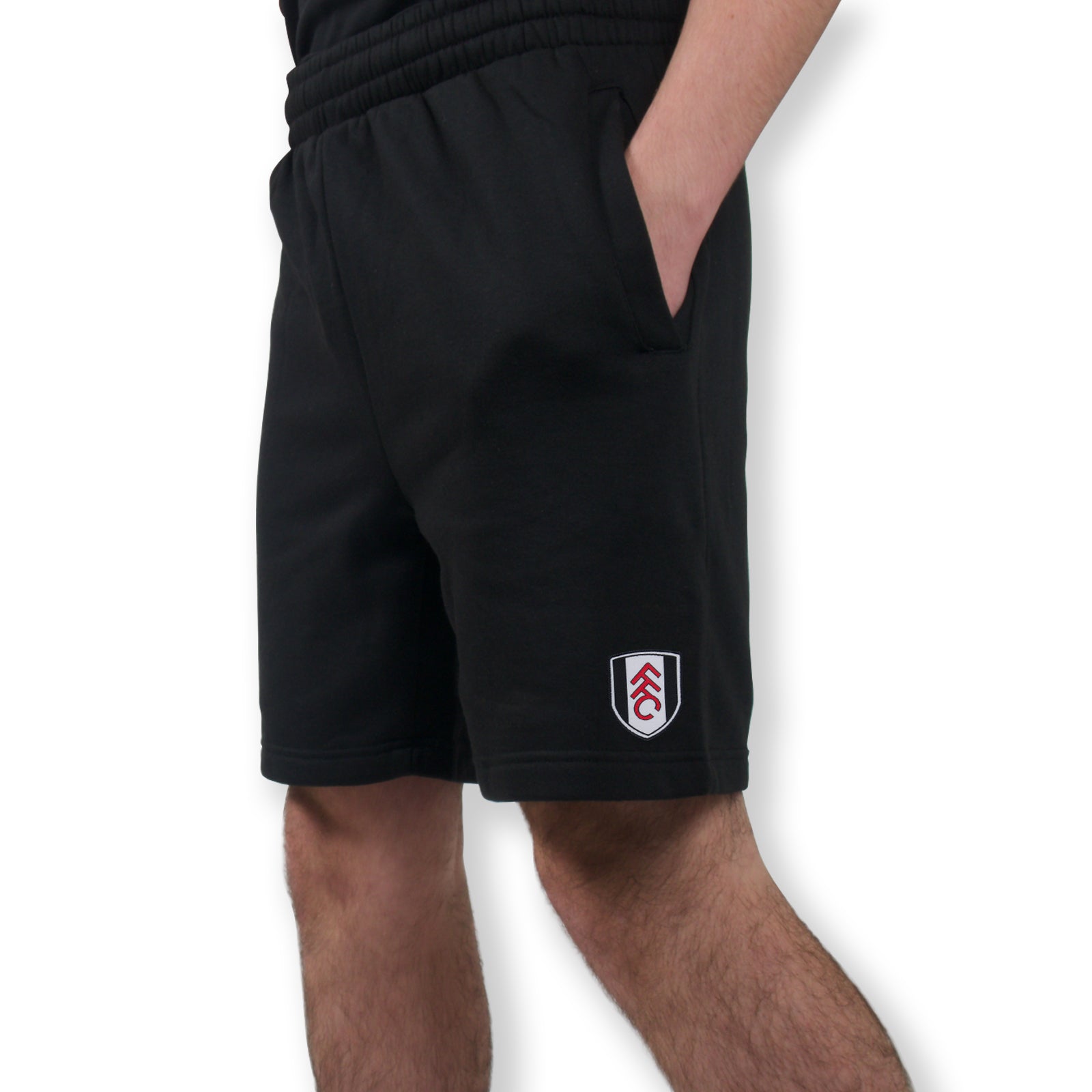 Fulham adults fleece shorts in black with crest to left leg and pockets to front & back.