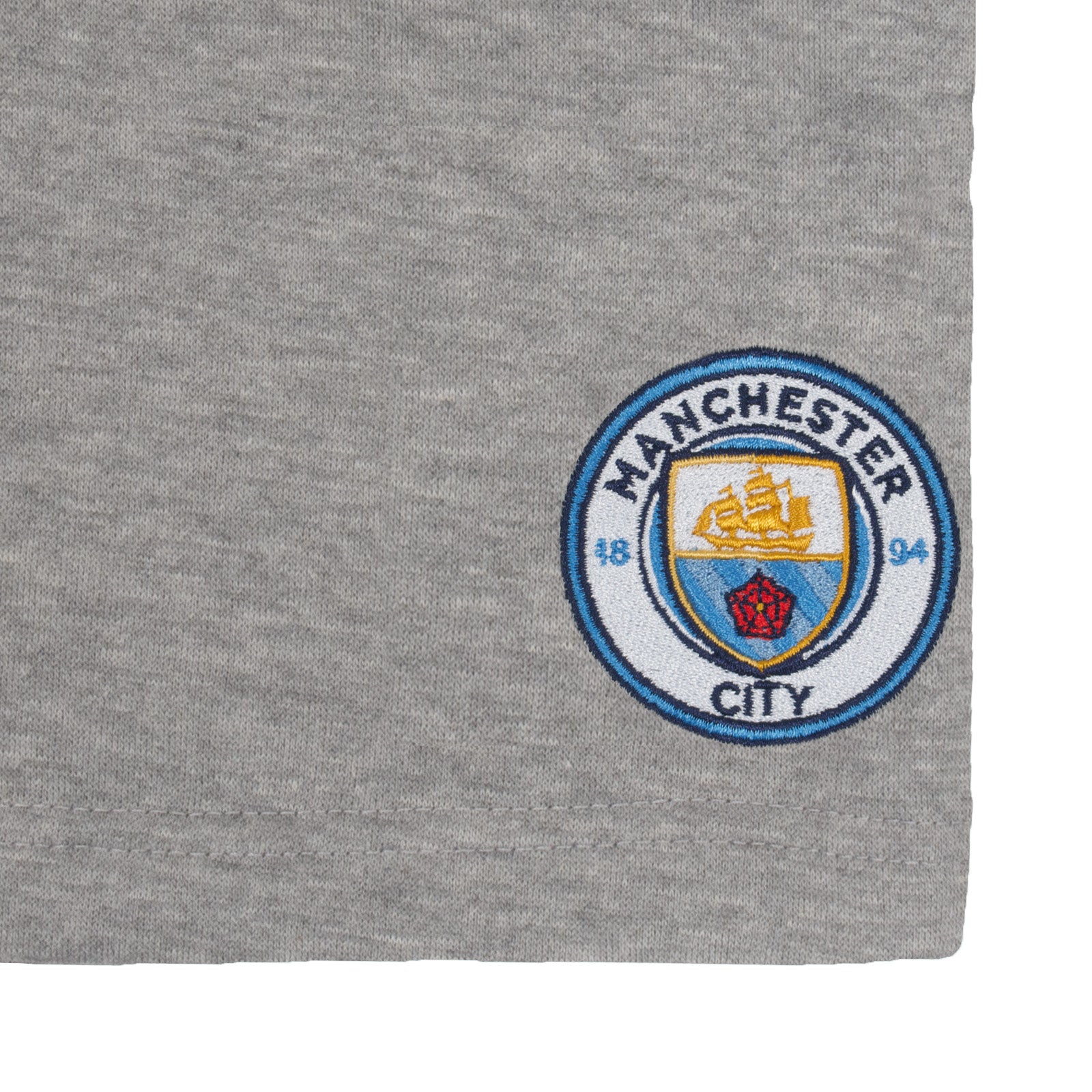 Man City adults fleece shorts in grey with crest to left leg and pockets to front & back.