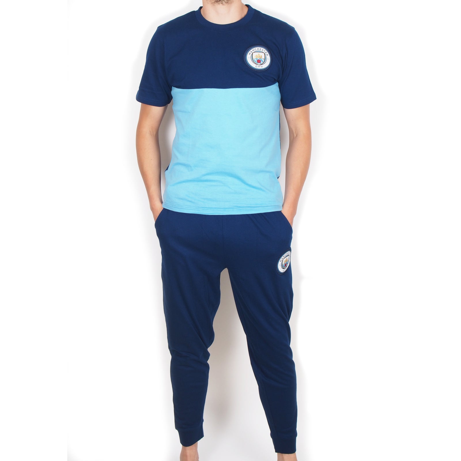 Man City adults long pyjamas in navy blue. Two-tone short sleeve top with crest and long bottoms with badge