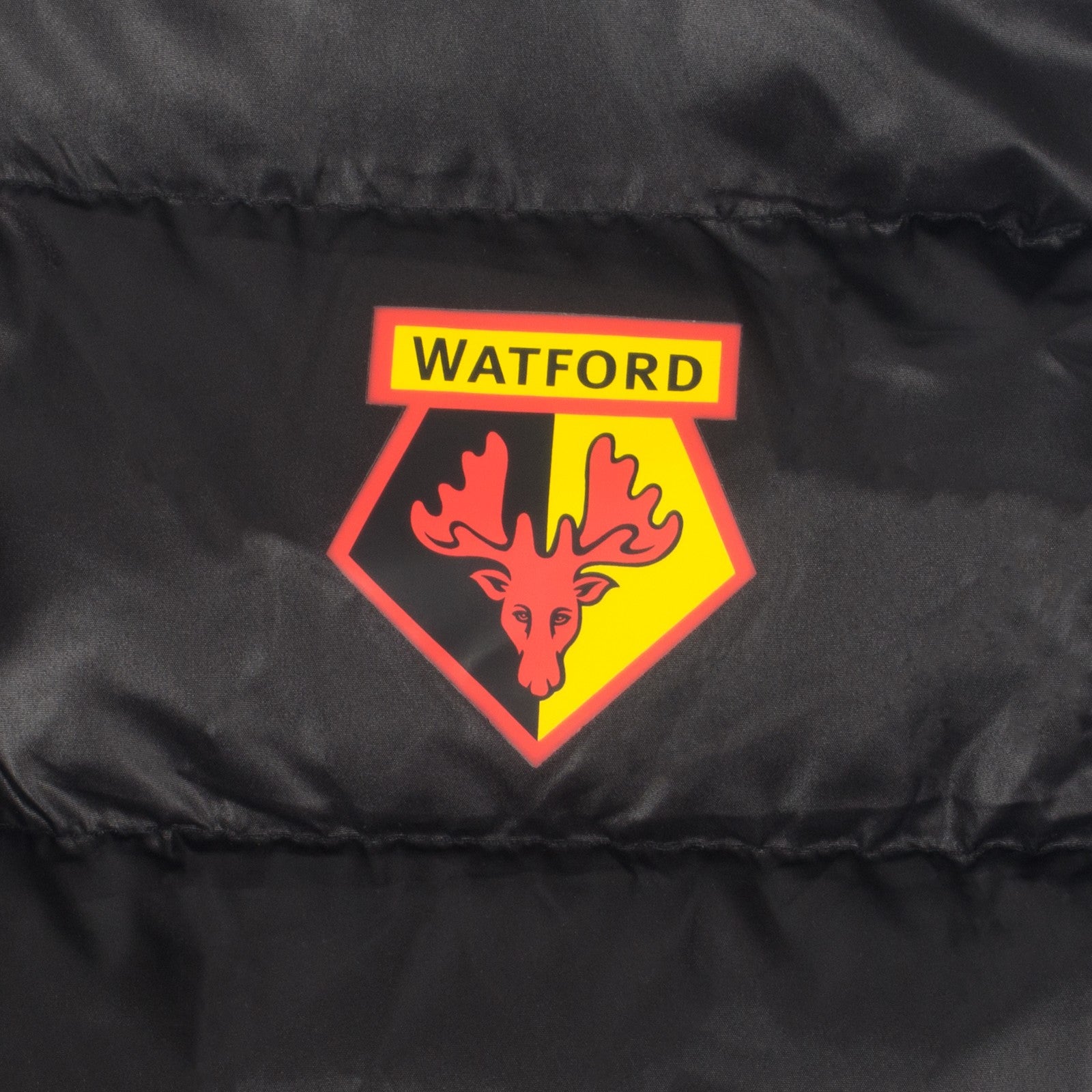 Watford adults padded gilet in black with club crest print to chest.
