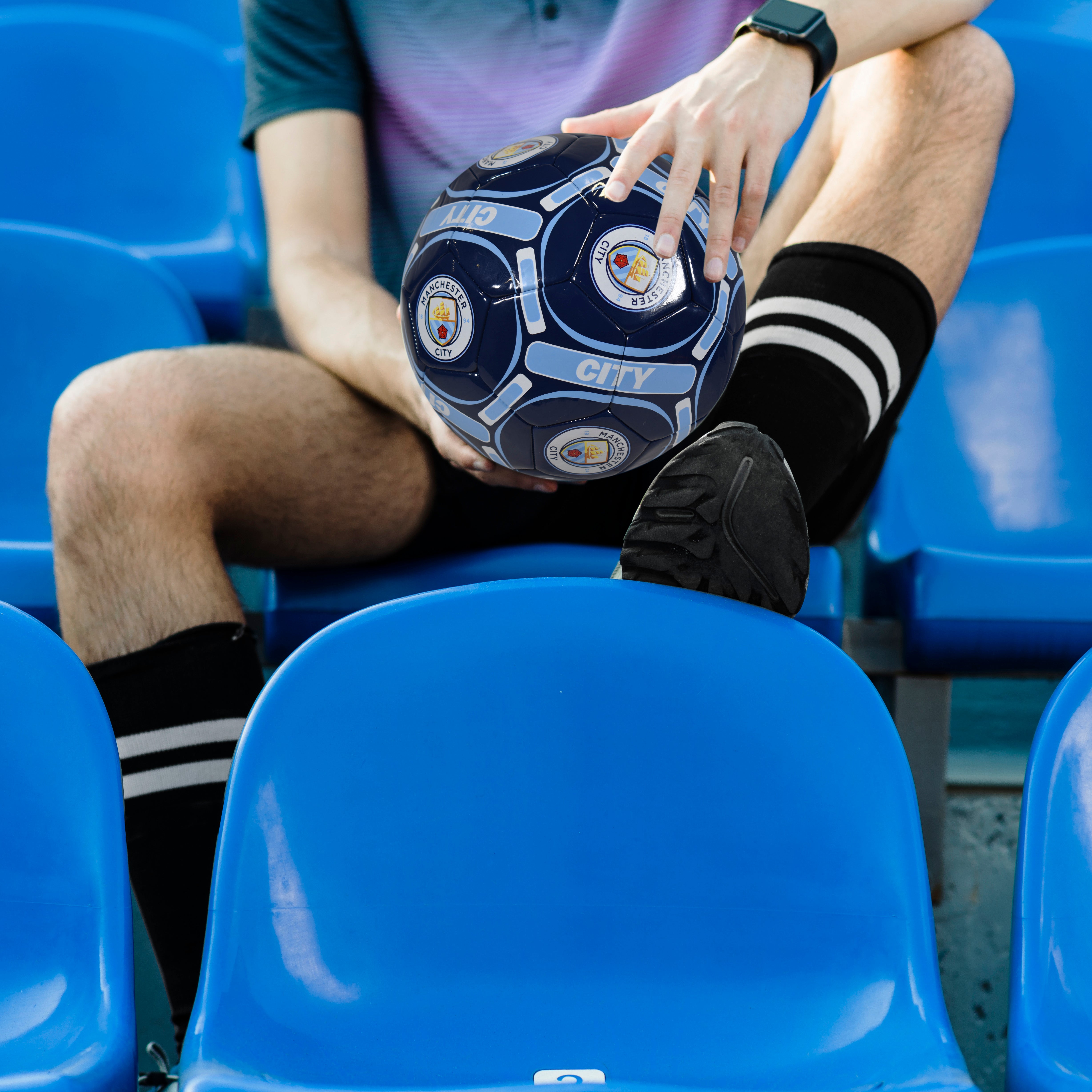 Man City size 4 blue football with MCFC crests & text.