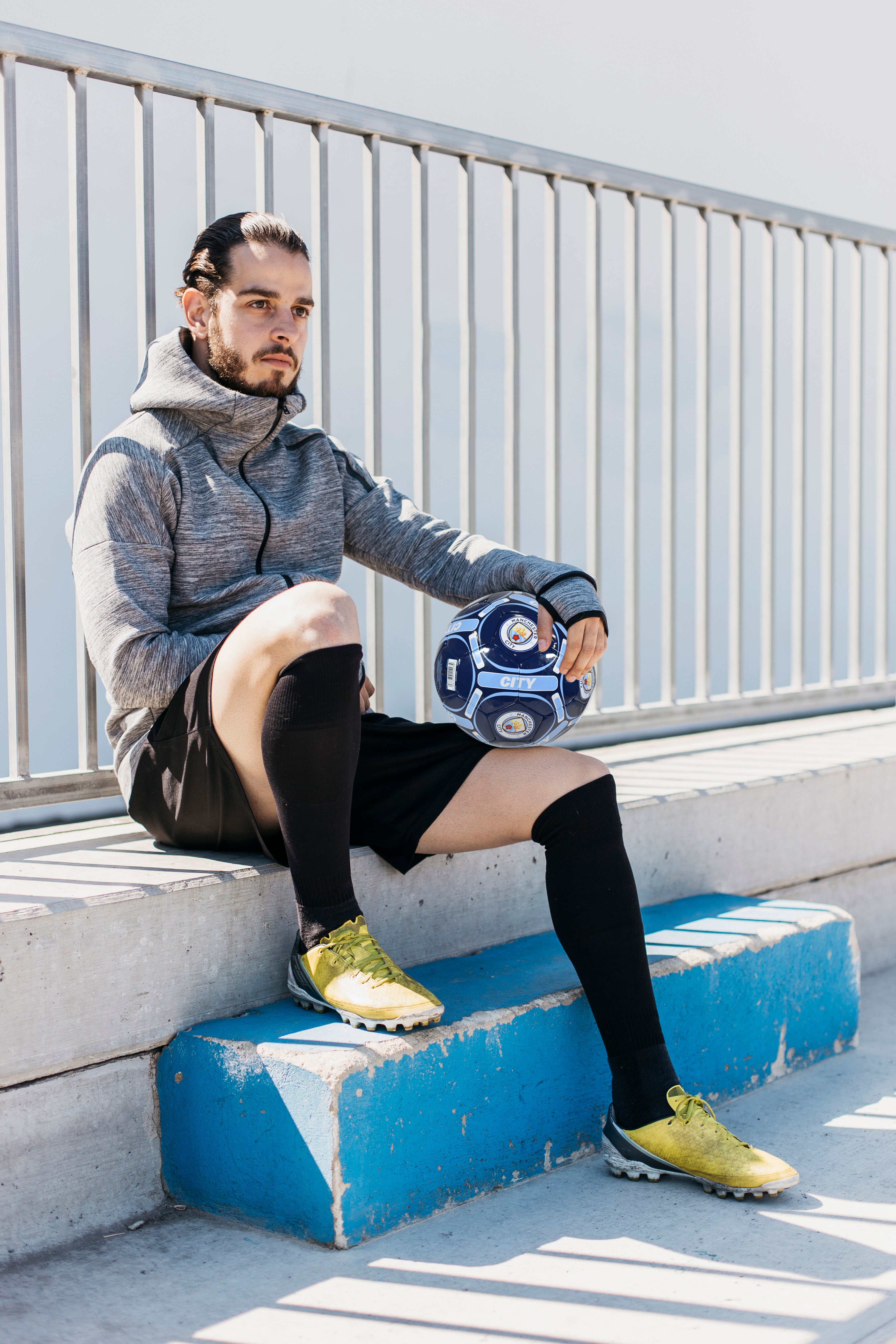 Man City size 4 blue football with MCFC crests & text.