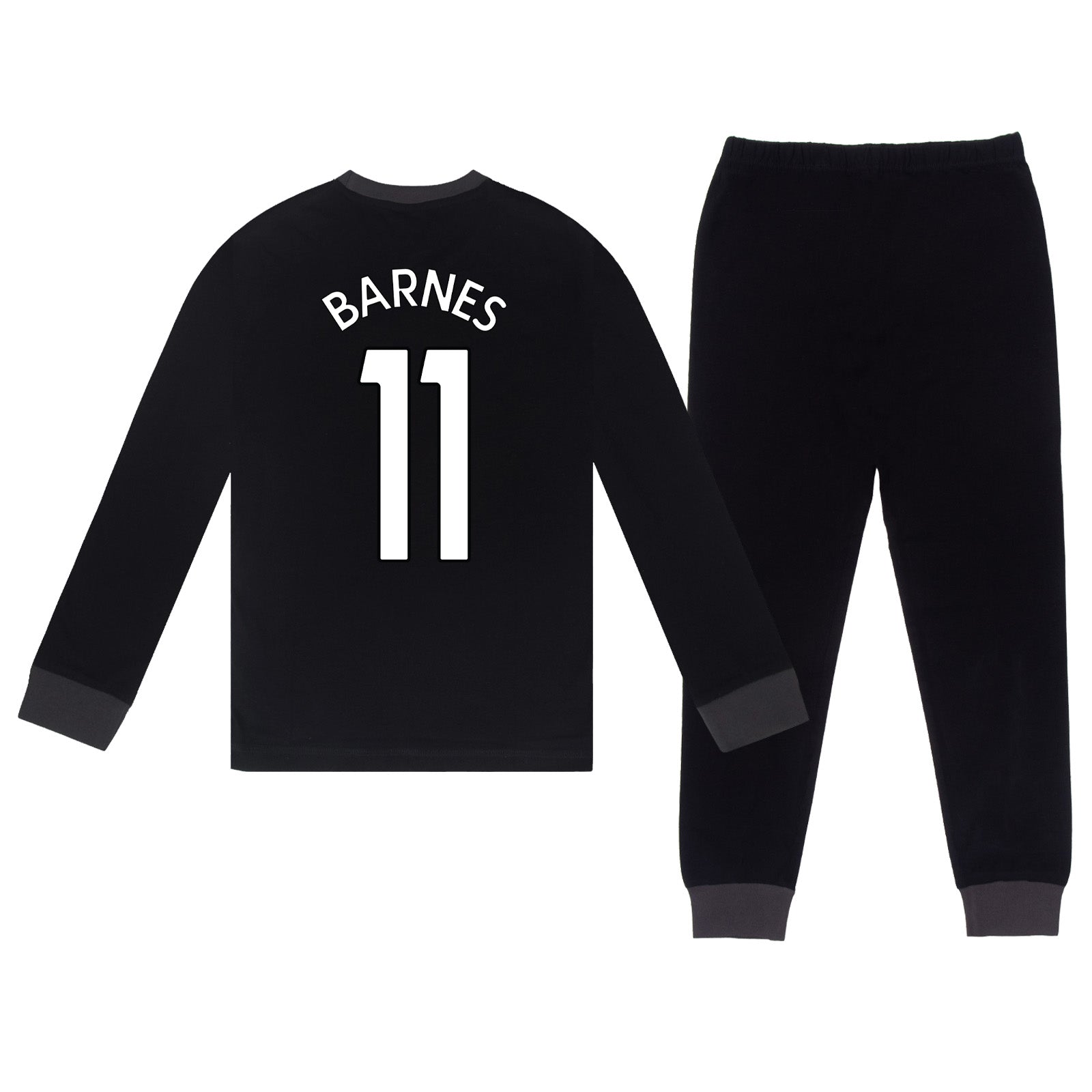 Newcastle Utd kids long pyjamas in black with long sleeve top with graphic crest with long legged bottoms