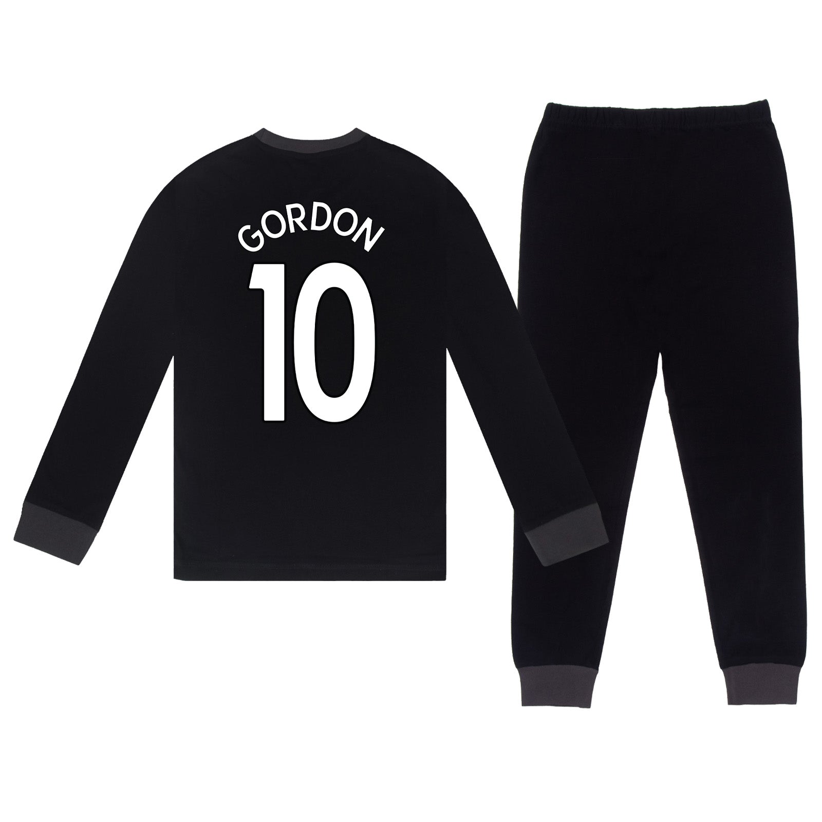 Newcastle Utd kids long pyjamas in black with long sleeve top with graphic crest with long legged bottoms
