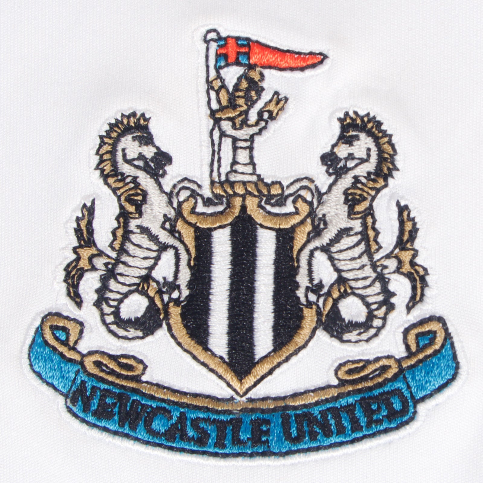 Newcastle United adults T-shirt in white with club crest to chest.