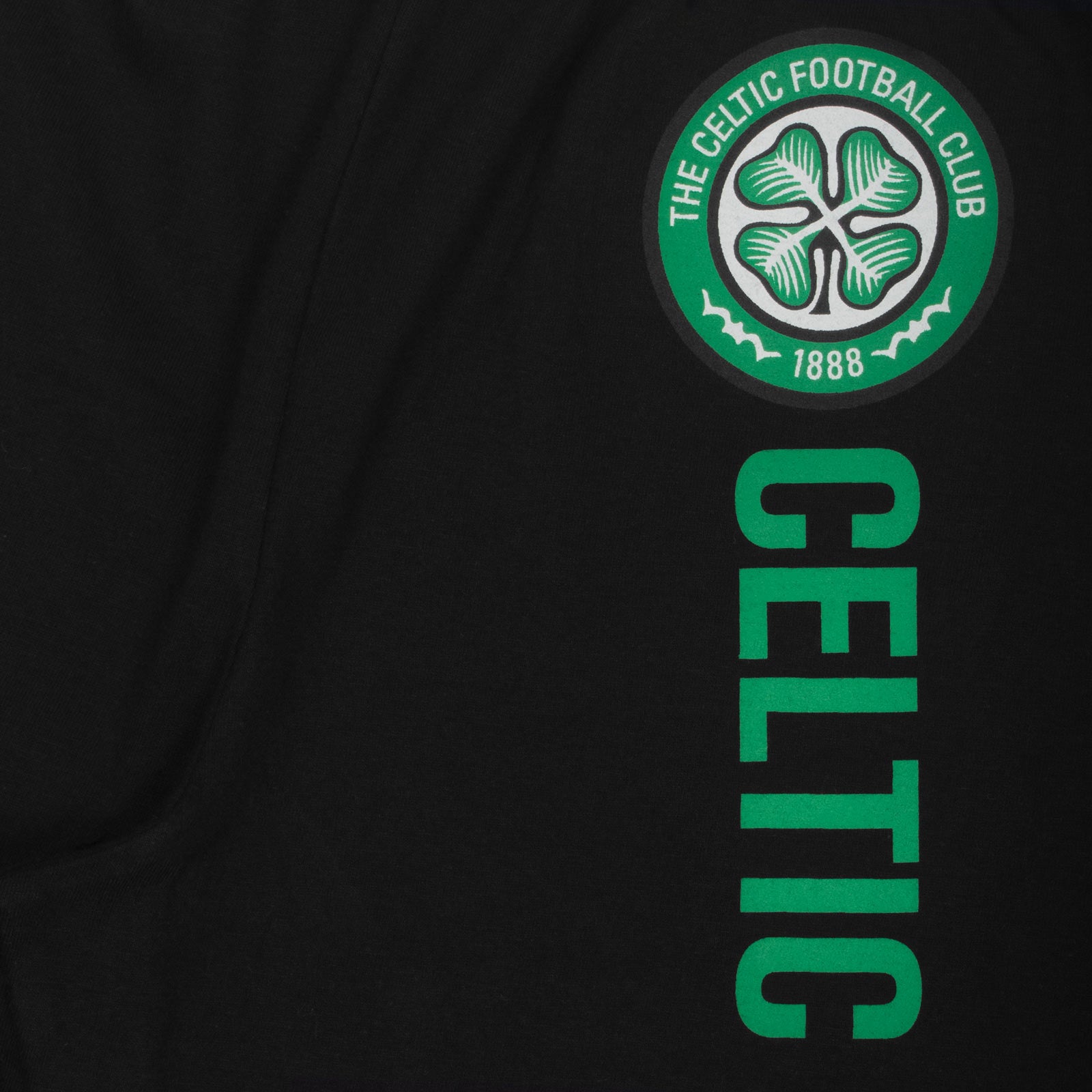 Celtic kids long pyjamas in black & grey. Long sleeve top with graphic and club crest. Long legged bottoms with crest.