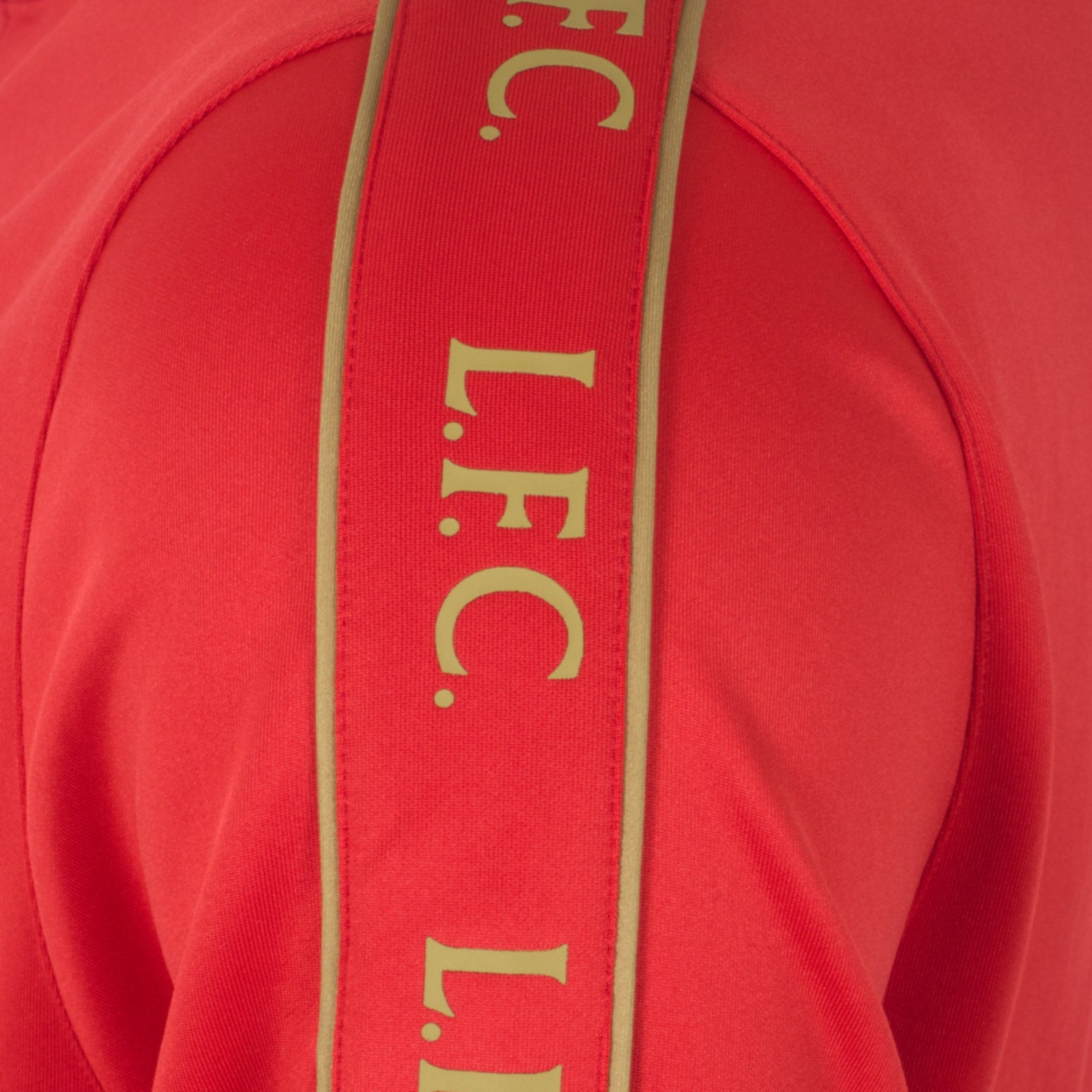 Liverpool adults tracksuit in black with club crest to chest and left thigh