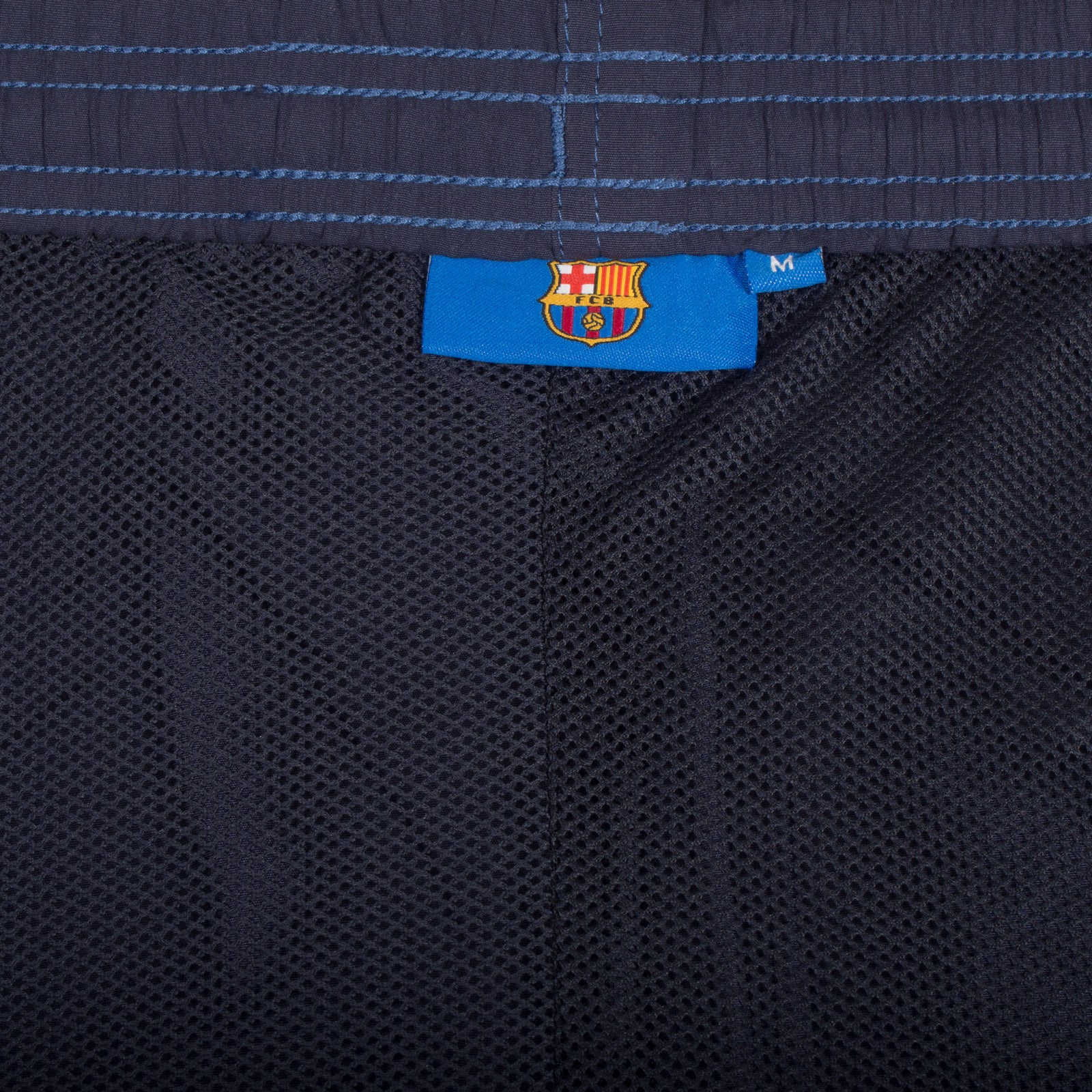 FC Barcelona adults fleece shorts in navy blue with crest to left leg and pockets to front & back.