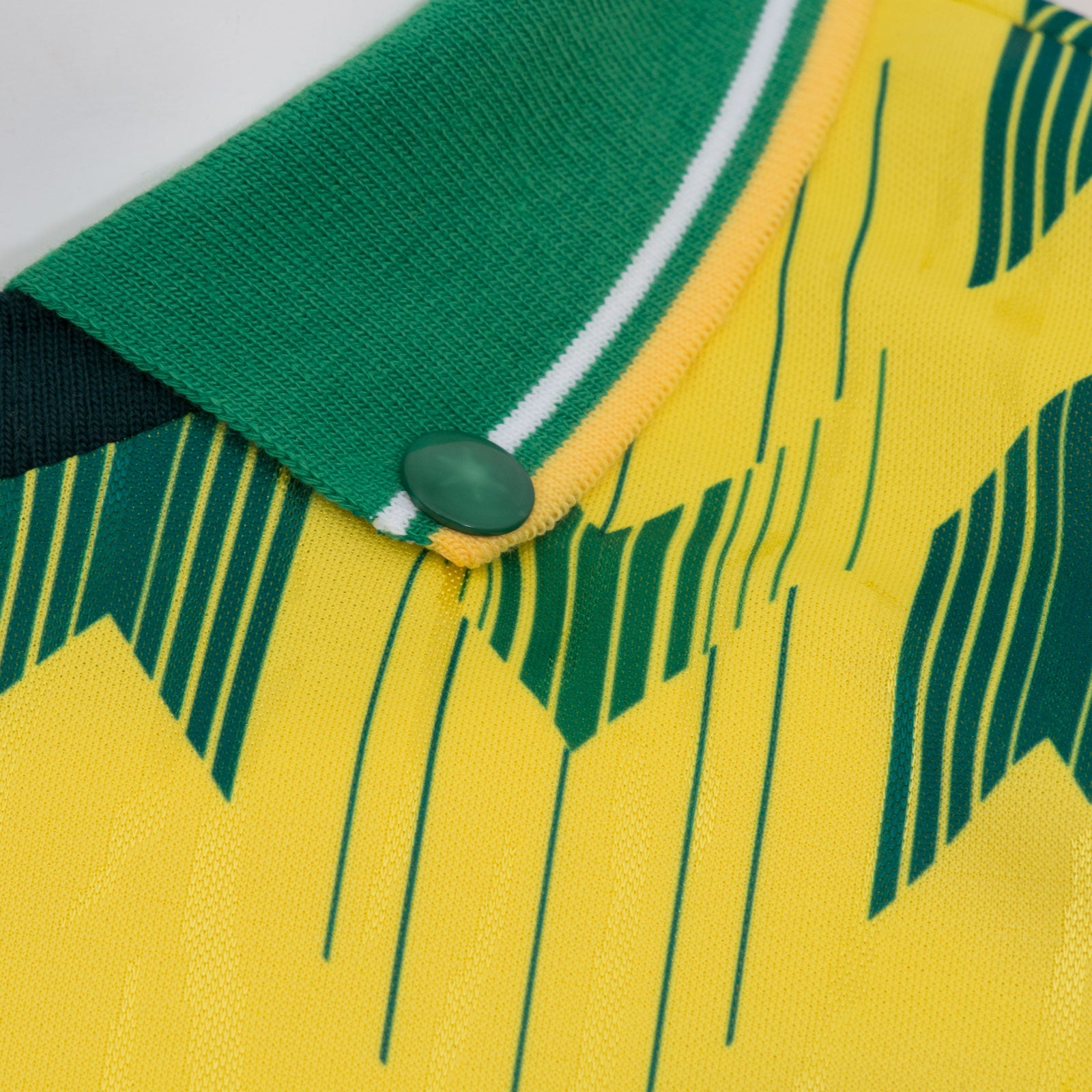 Celtic retro football shirt. Replica 1989/91 away shirt in yellow with club crest and sponsor print to front