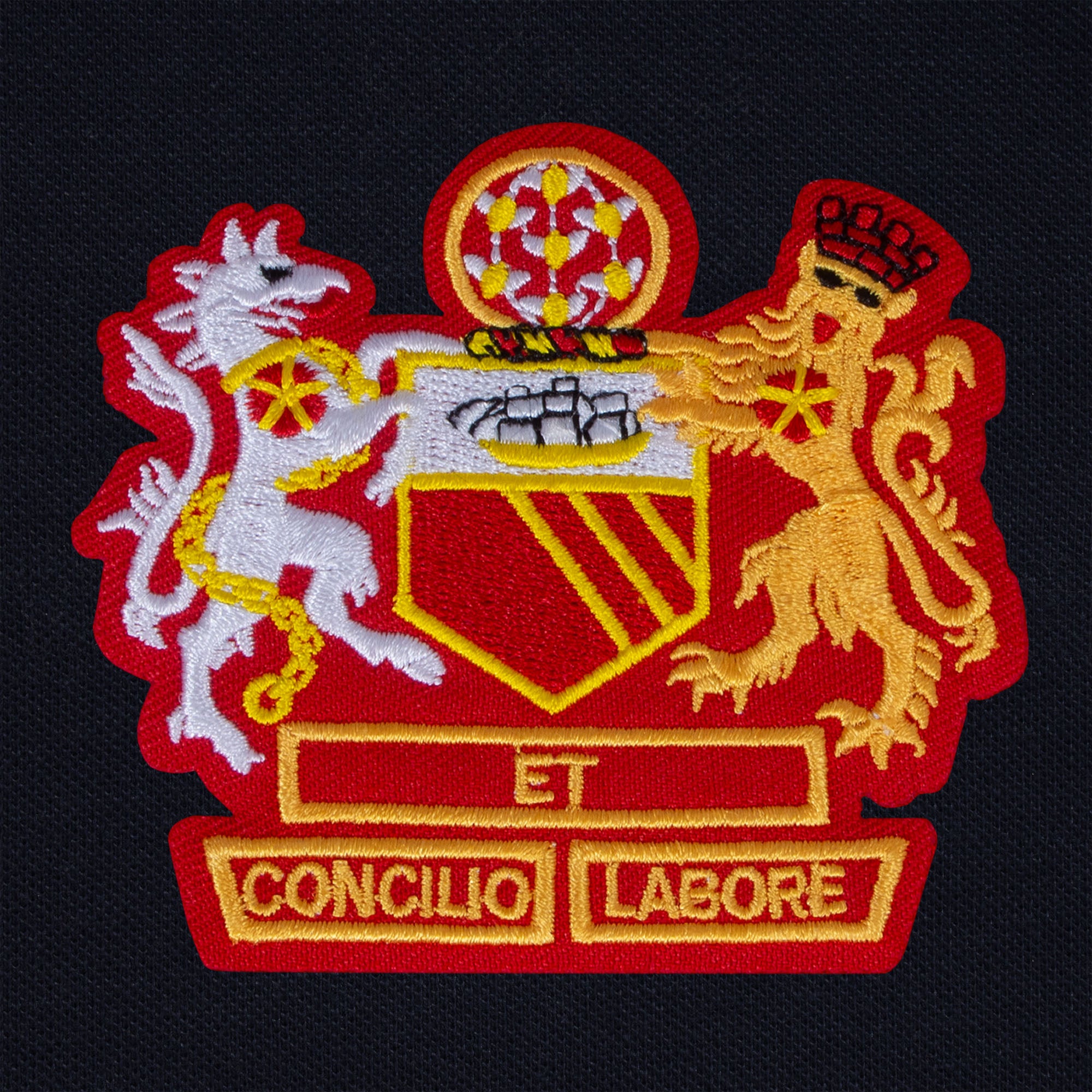 United retro polo shirt in navy with Manchester crest