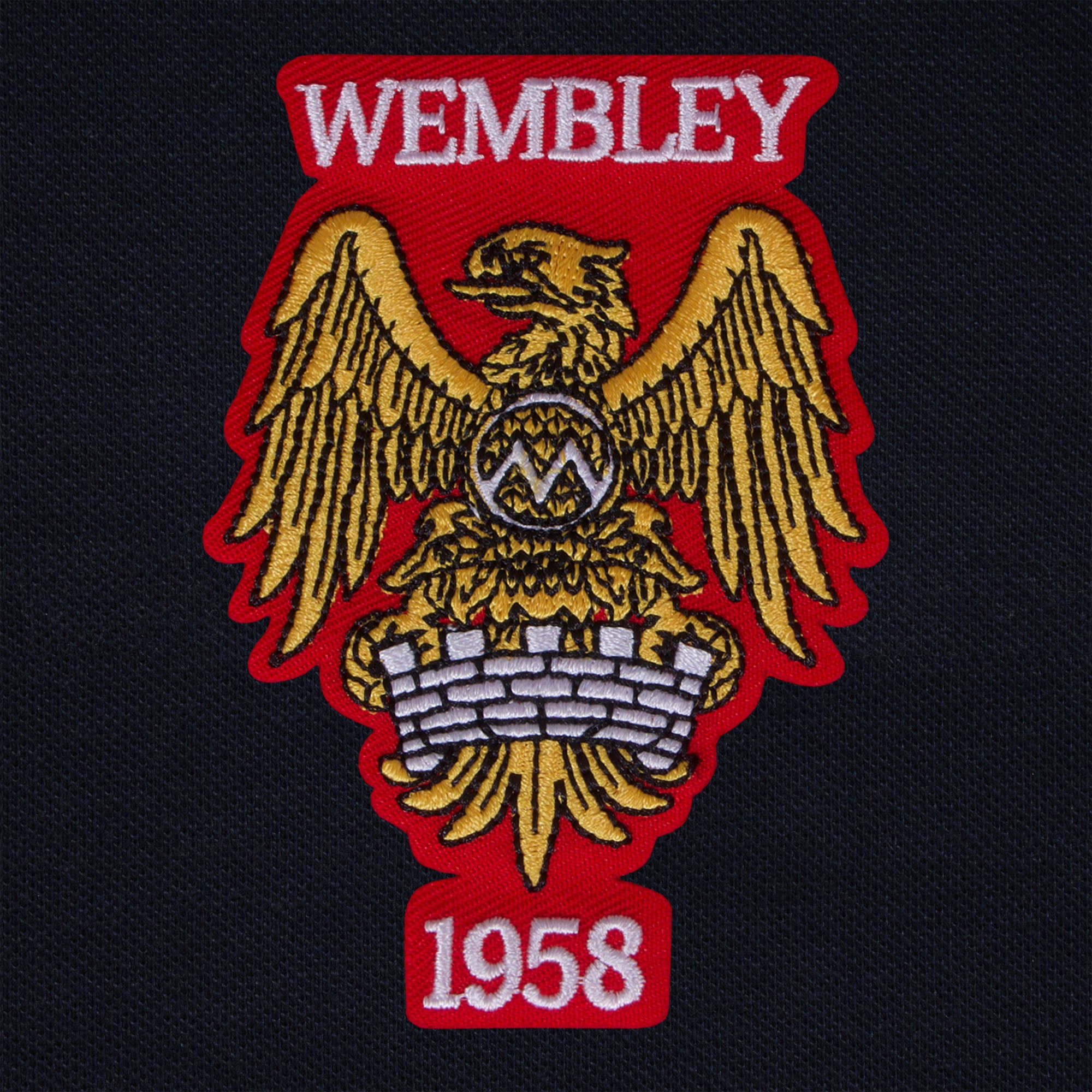 United polo shirt in navy with Wembley 58 crest