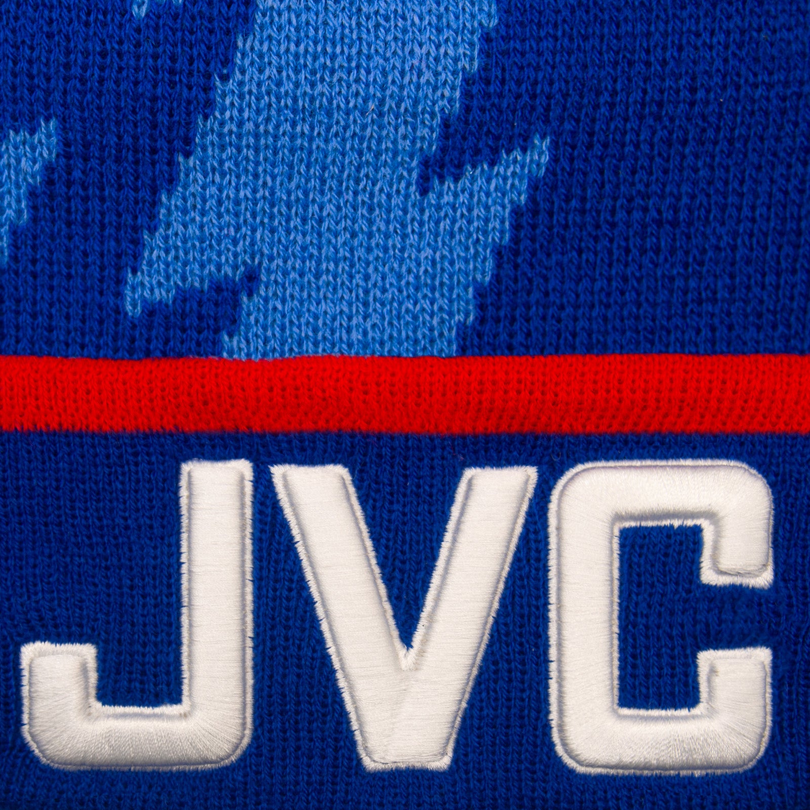 Arsenal retro knitted bobble hat in blue with text to front