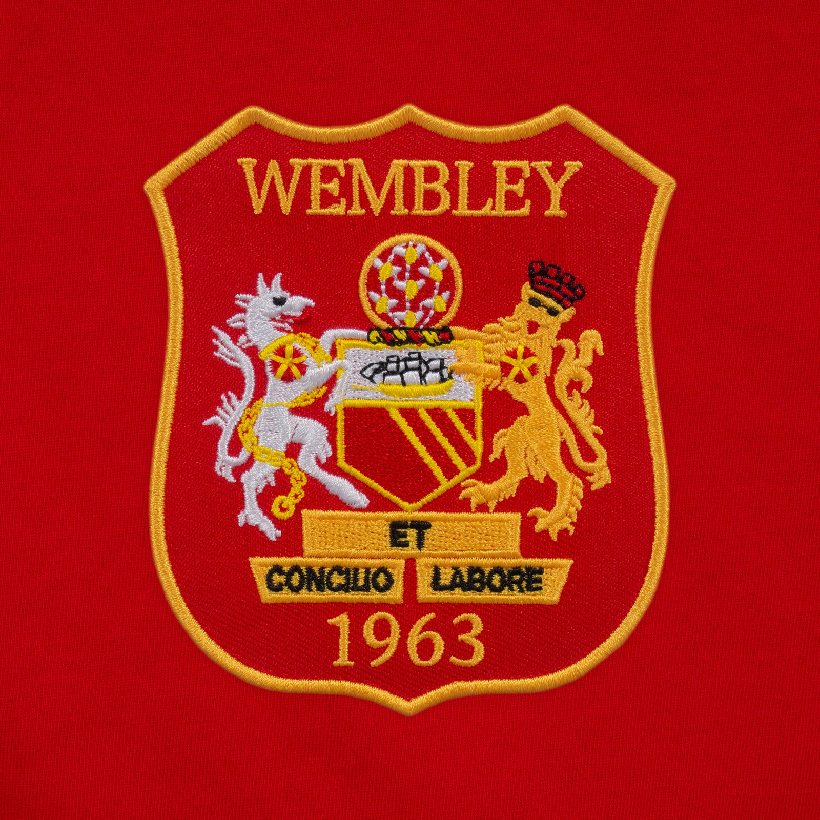 Man Utd adults retro shirt in red featuring 1963 Wembley crest