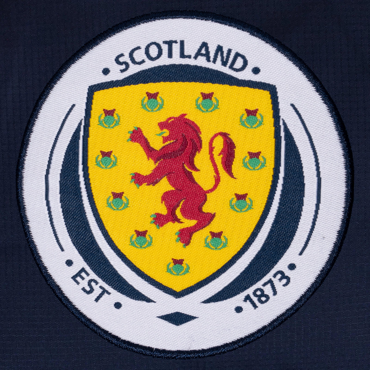 Scotland adults quilted jacket in navy blue with national team crest to chest.
