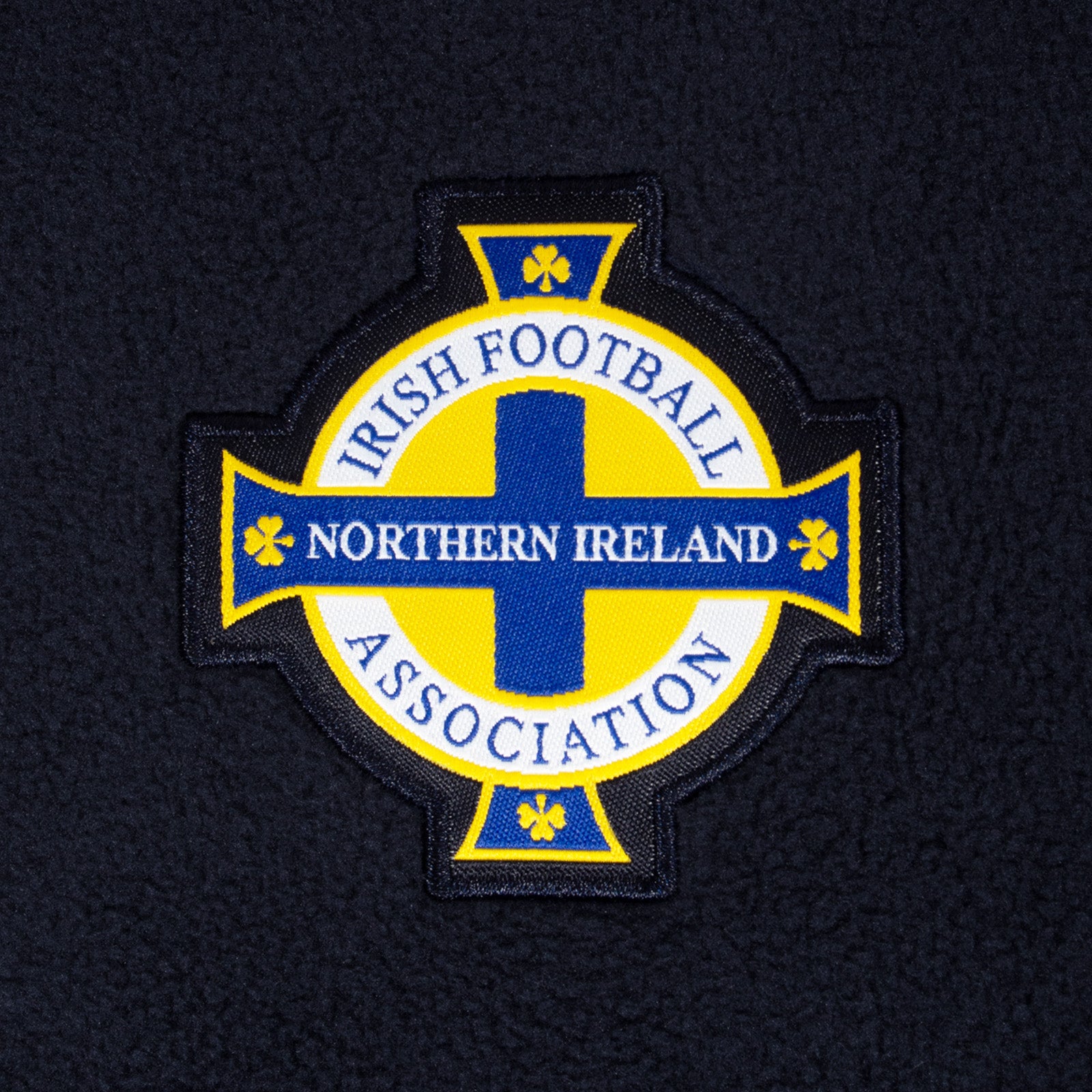 Northern Ireland adults microfleece jacket in navy with a woven club crest to chest.