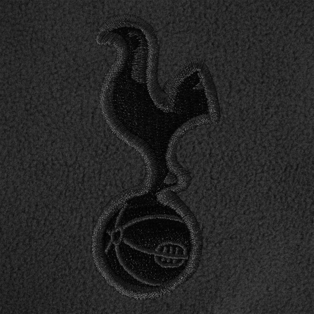Tottenham Hotspur adults microfleece jacket in grey with a woven club crest to chest.