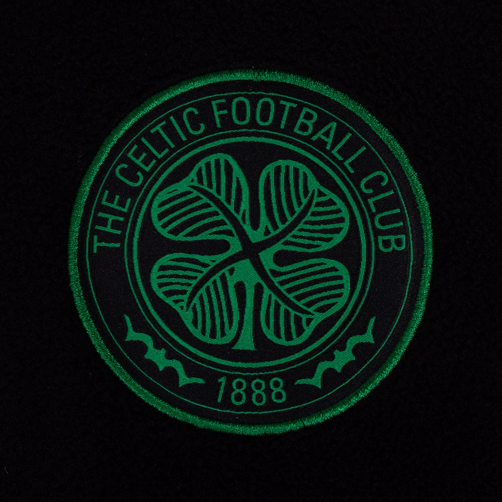 Celtic adults microfleece jacket in black with a woven club crest to chest.