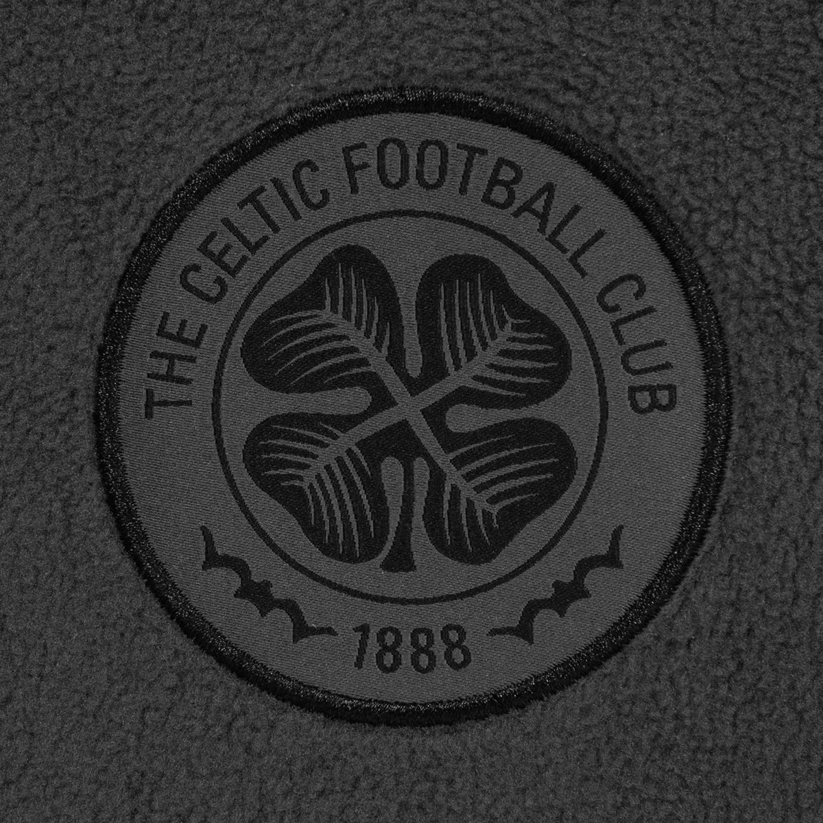 Celtic adults microfleece jacket in black with a woven club crest to chest.