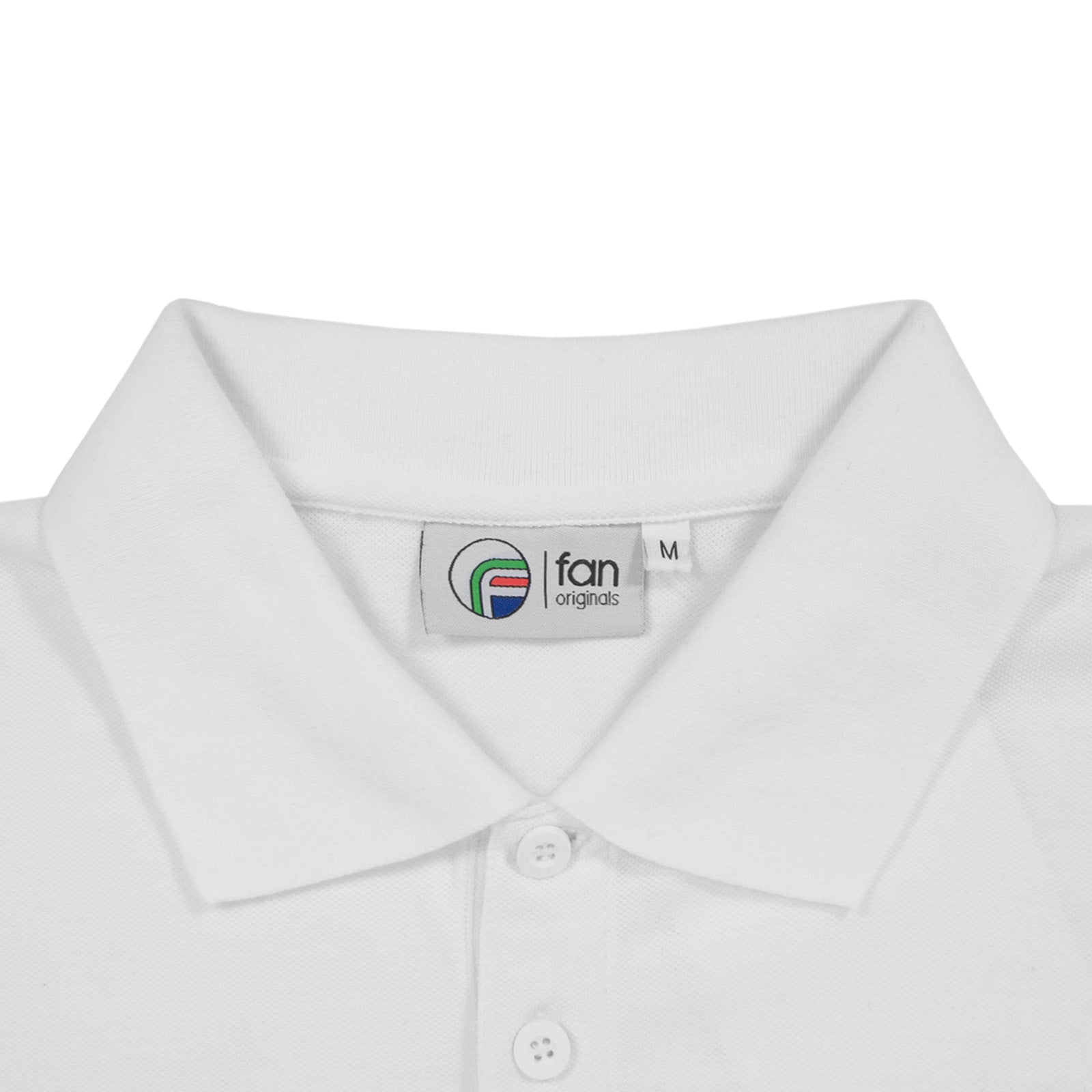 Leeds retro polo shirt in white with a smiley embroidered crest applique patch to chest