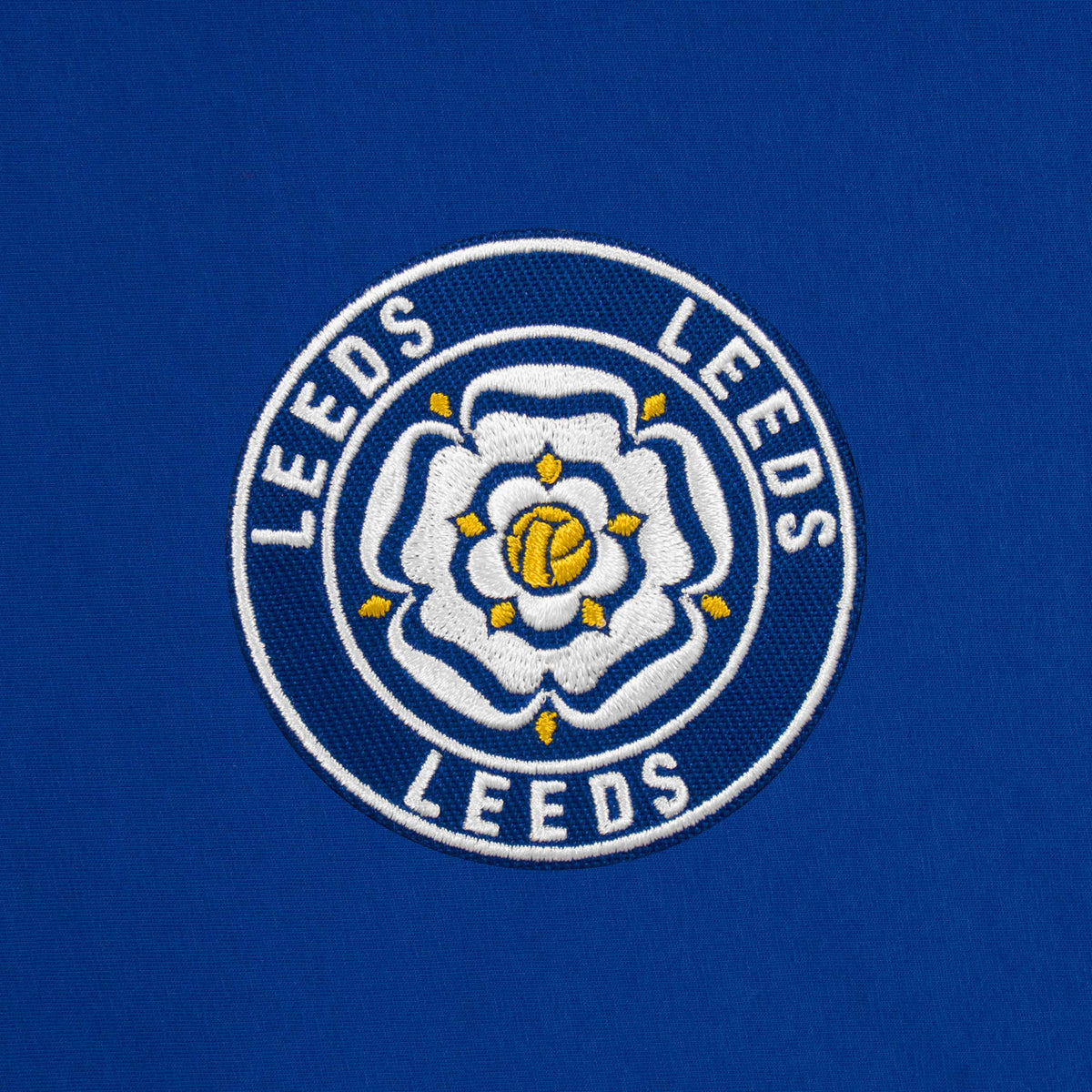 Leeds retro crew neck t-shirt in royal with embroidered applique rose crest