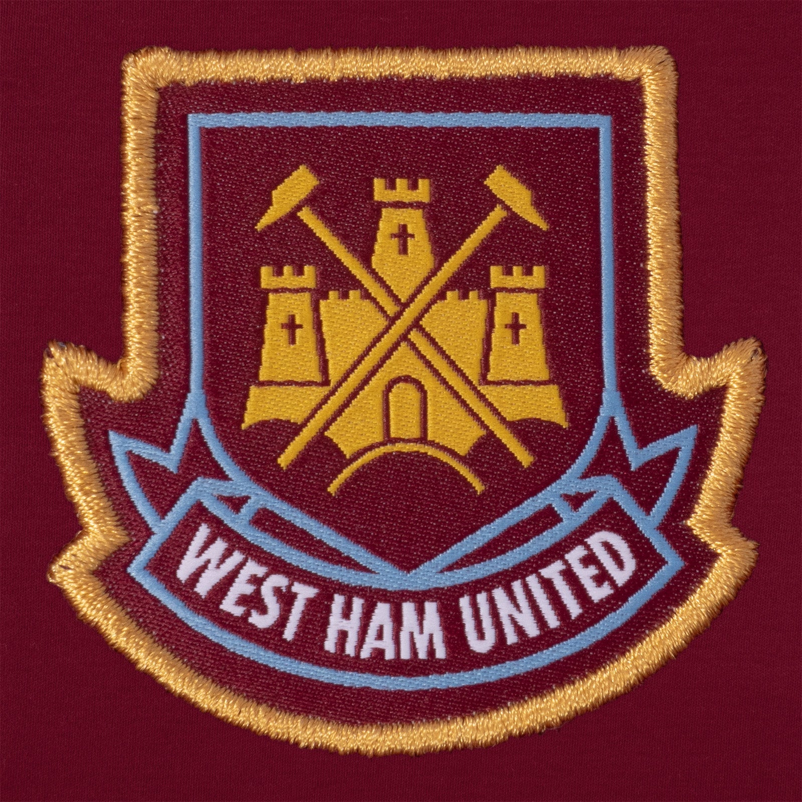 West Ham United FC baby sleepsuit in retro 2000 home kit colours