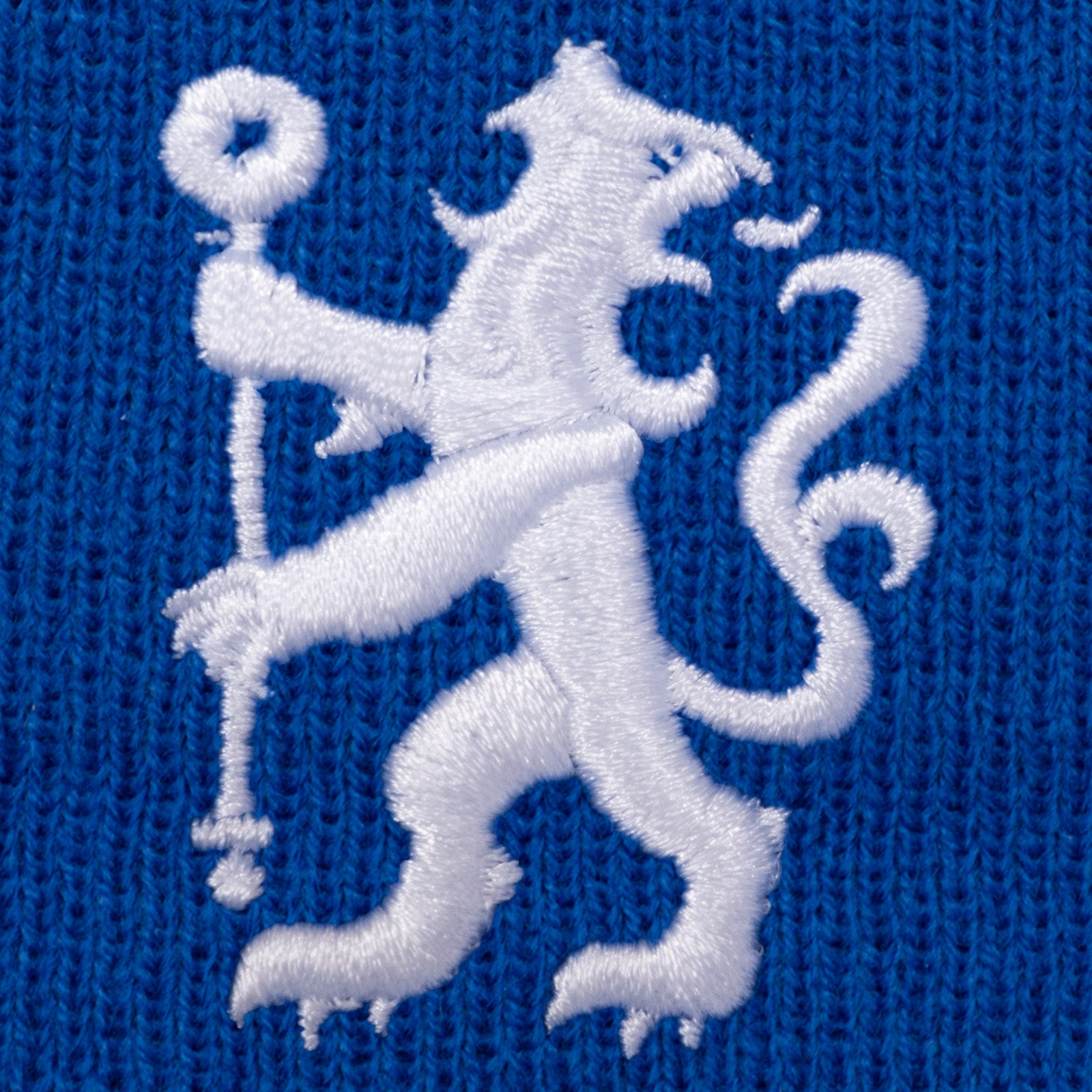 Chelsea bobble hat in royal blue with club lion logo and text to the front