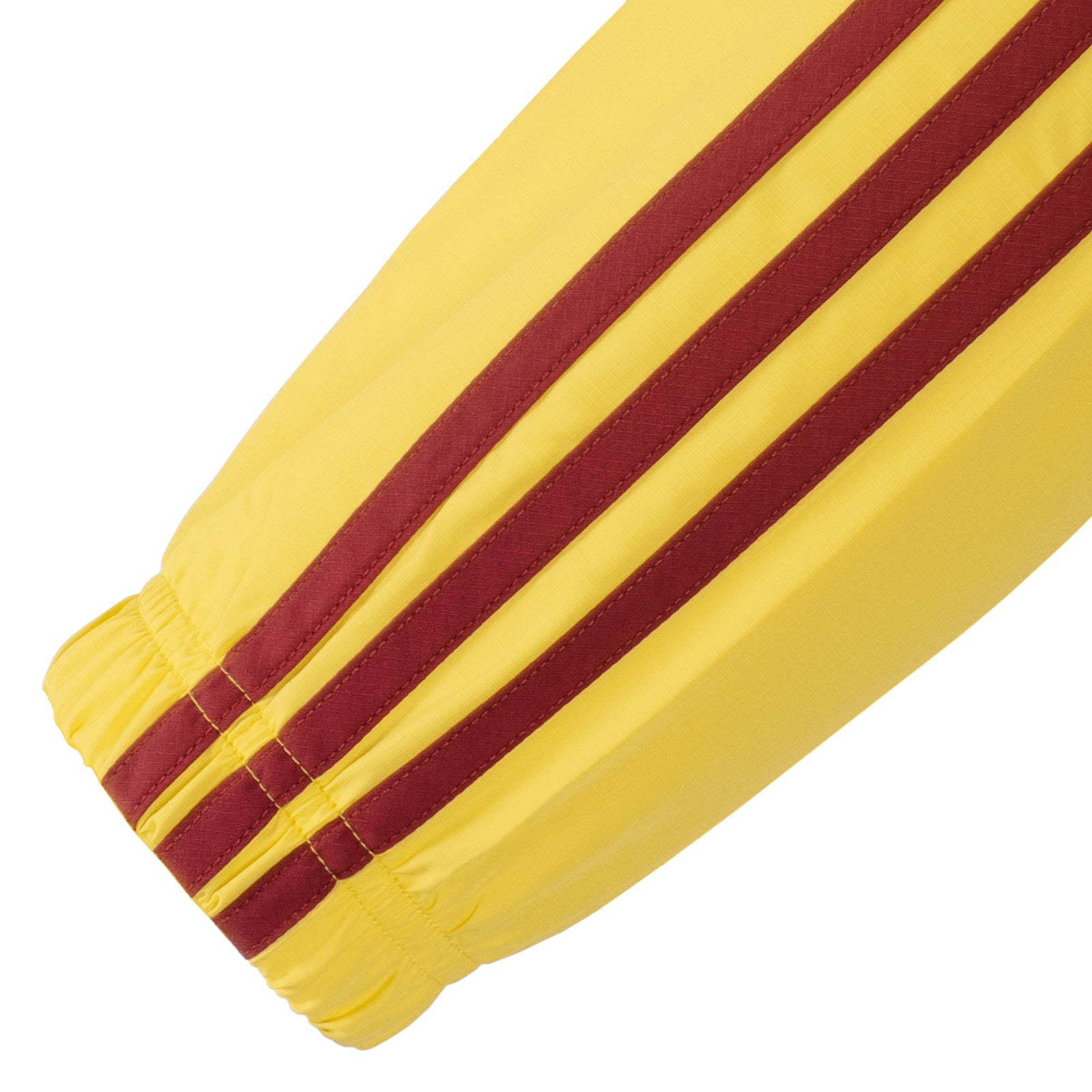 Arsenal adults shower jacket in yellow with club crest to chest