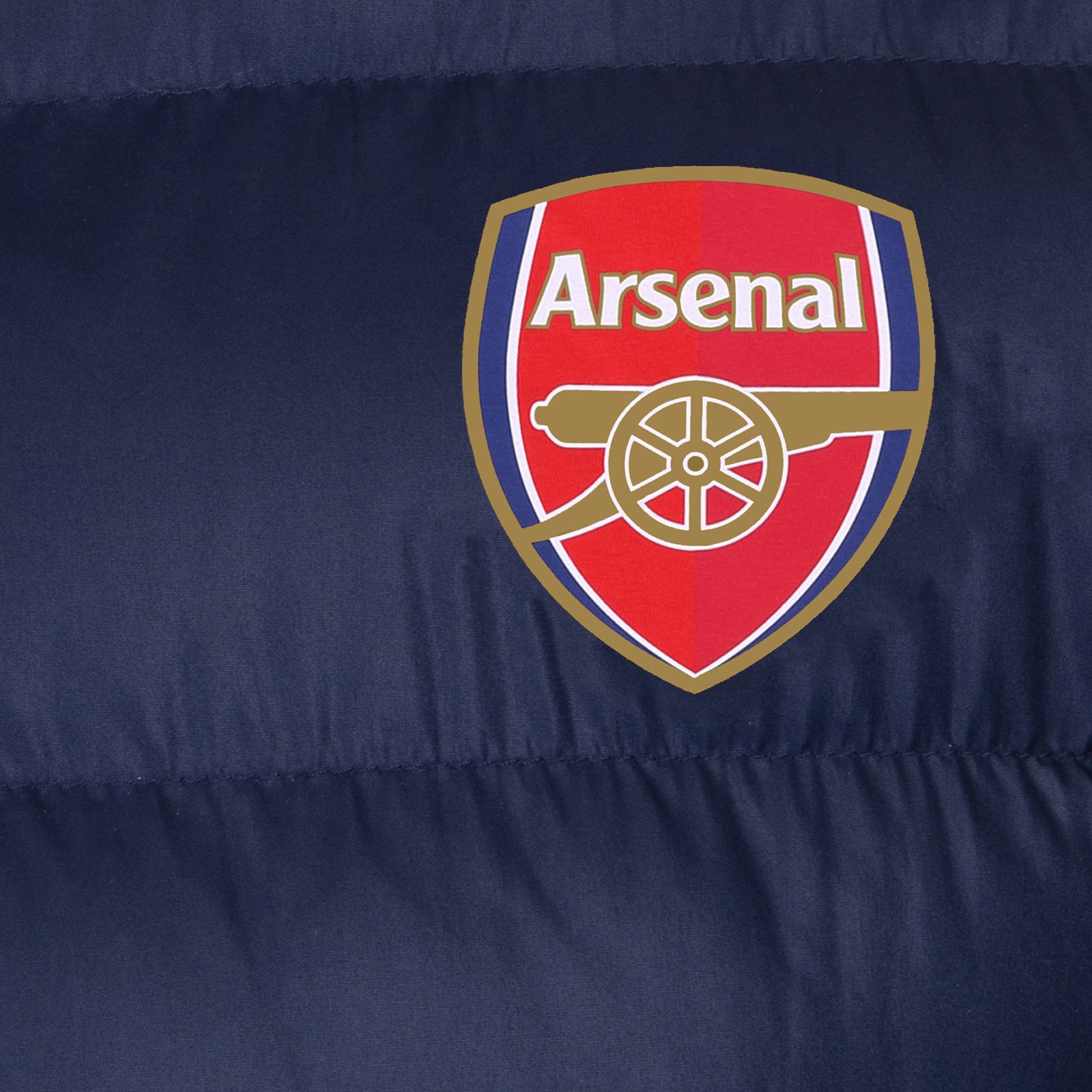 Arsenal adults quilted jacket coat in navy blue with club crest to chest.