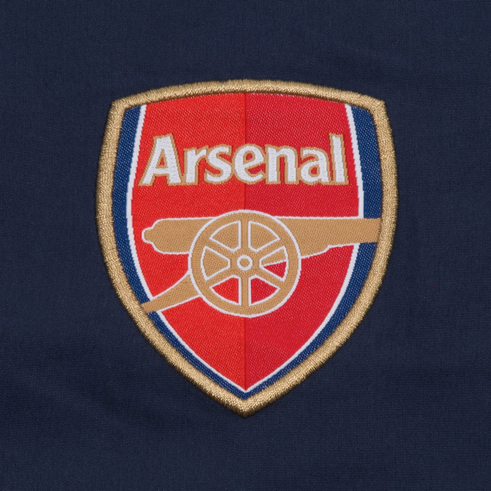 Arsenal kids tracksuit in red & navy stripe with club crest to chest and left thigh