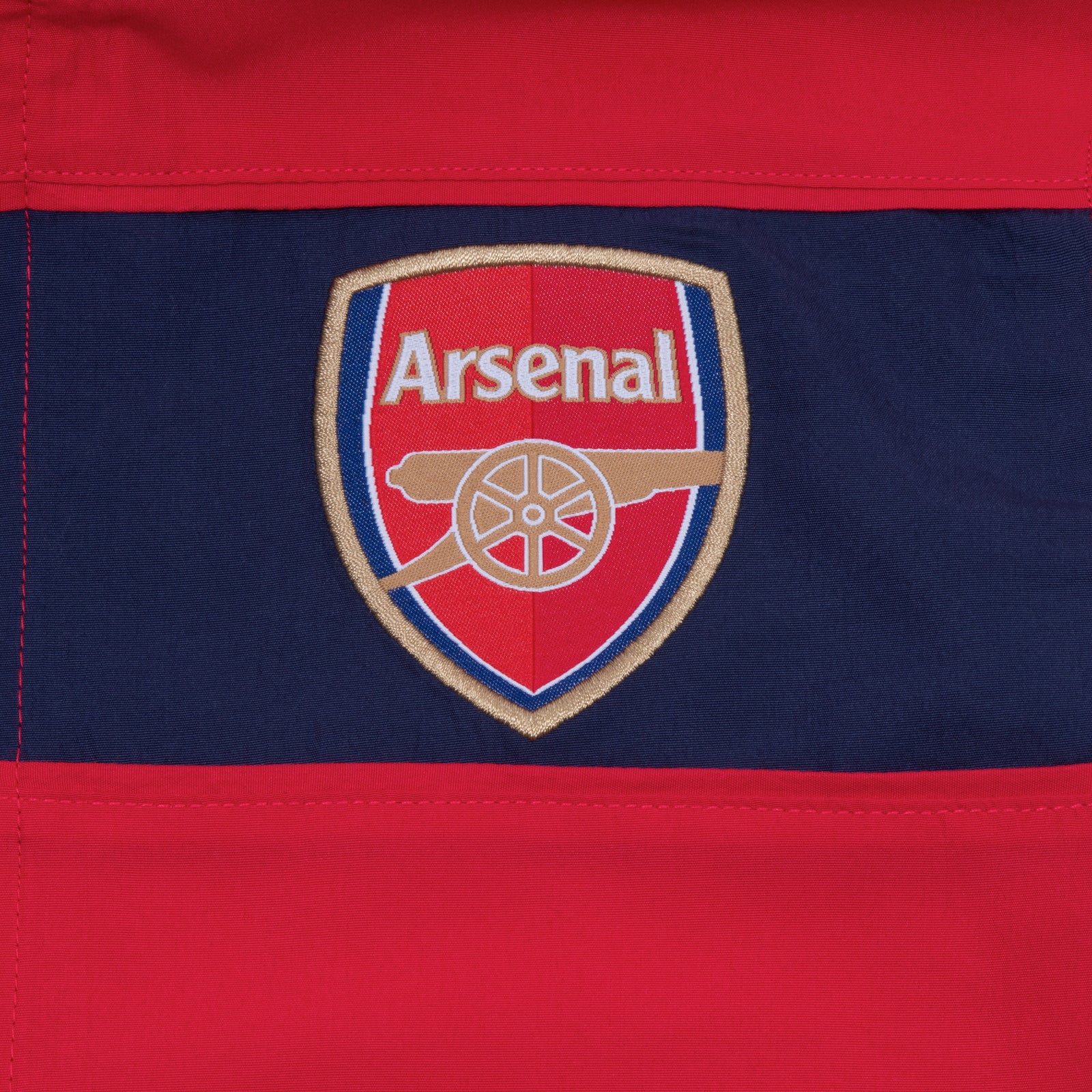 Arsenal kids tracksuit in red & navy stripe with club crest to chest and left thigh