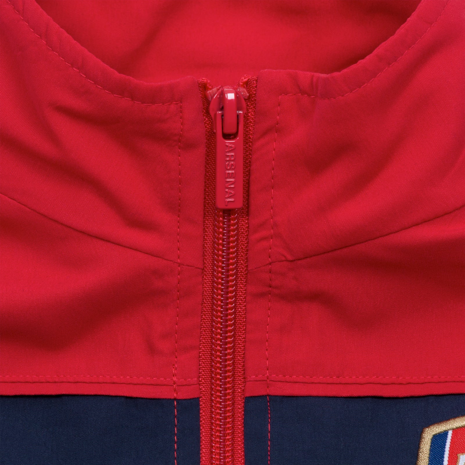 Arsenal kids tracksuit in red & navy stripe with club crest to chest and left thigh