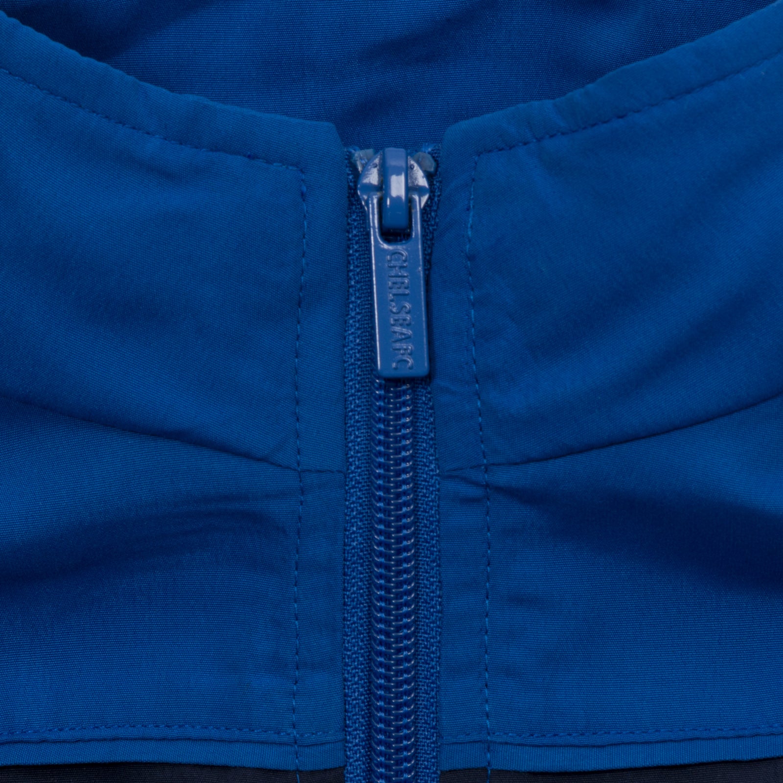 Chelsea kids tracksuit in royal blue with club crest to chest and left thigh