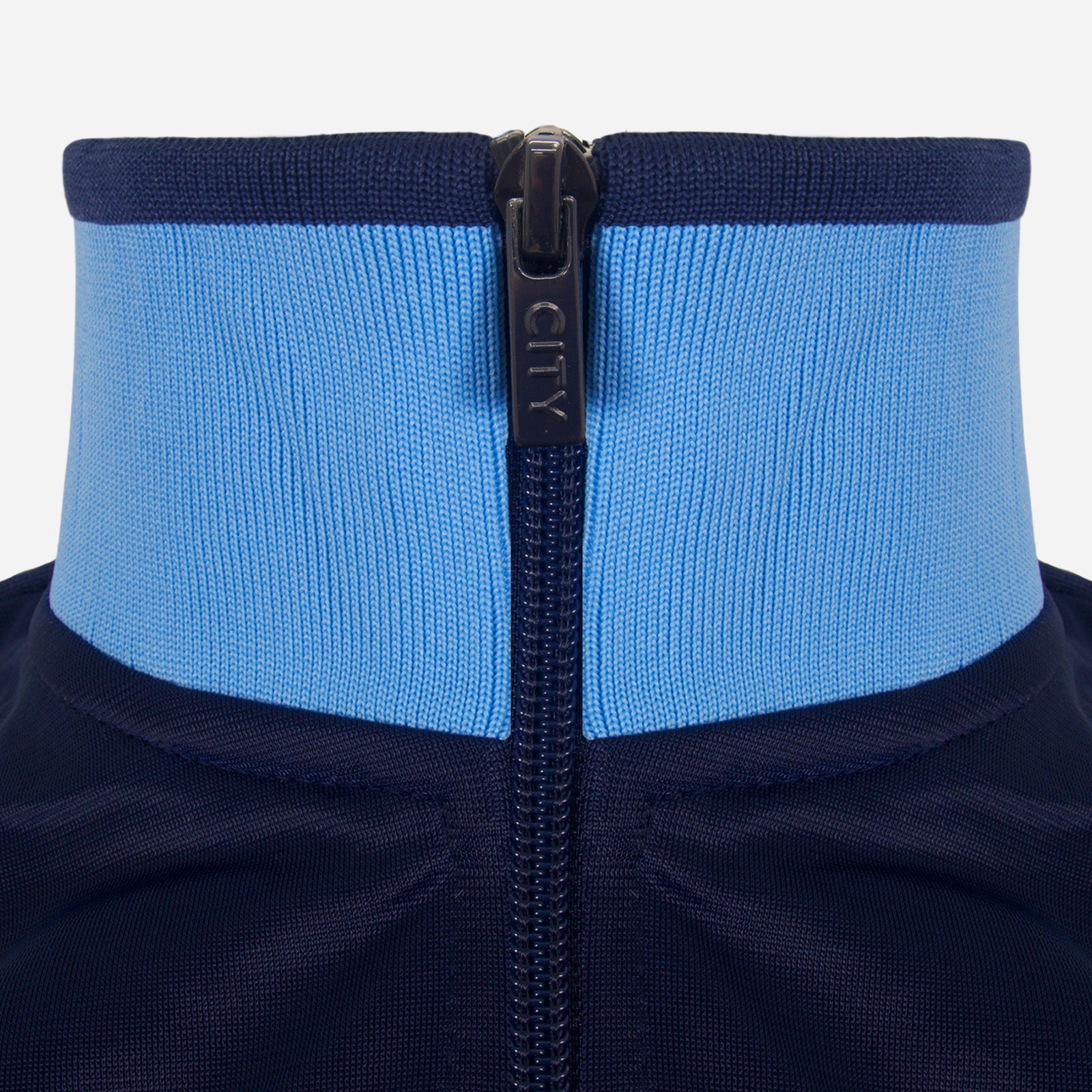 Man City kids retro track jacket in navy blue with club crest to chest.