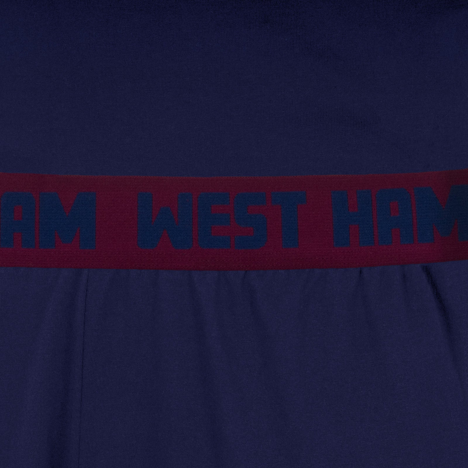 West Ham adults long pyjamas in navy blue. Long sleeved top with graphic print and long bottoms