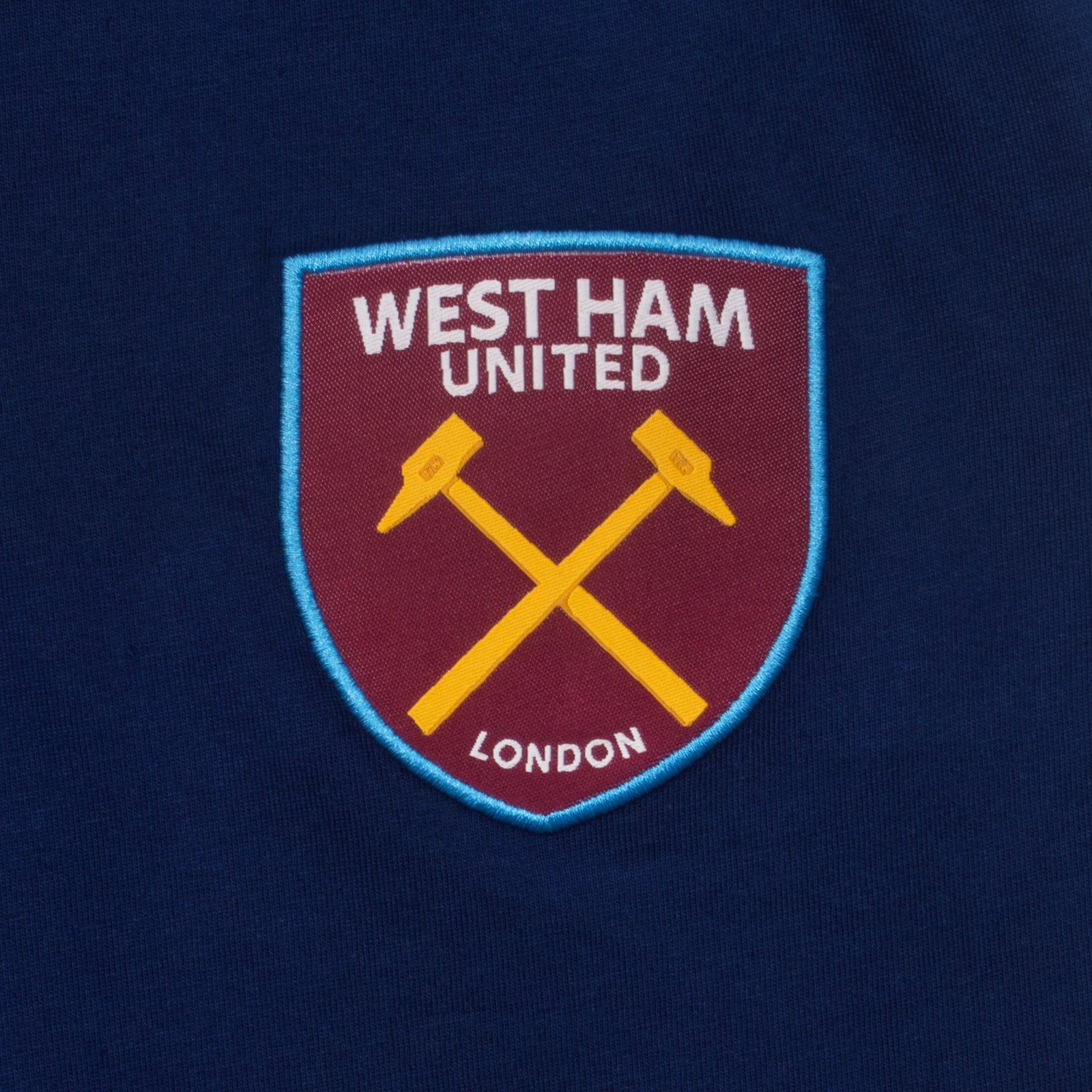West Ham adults long pyjamas in navy blue. Long sleeved top with graphic print and long bottoms