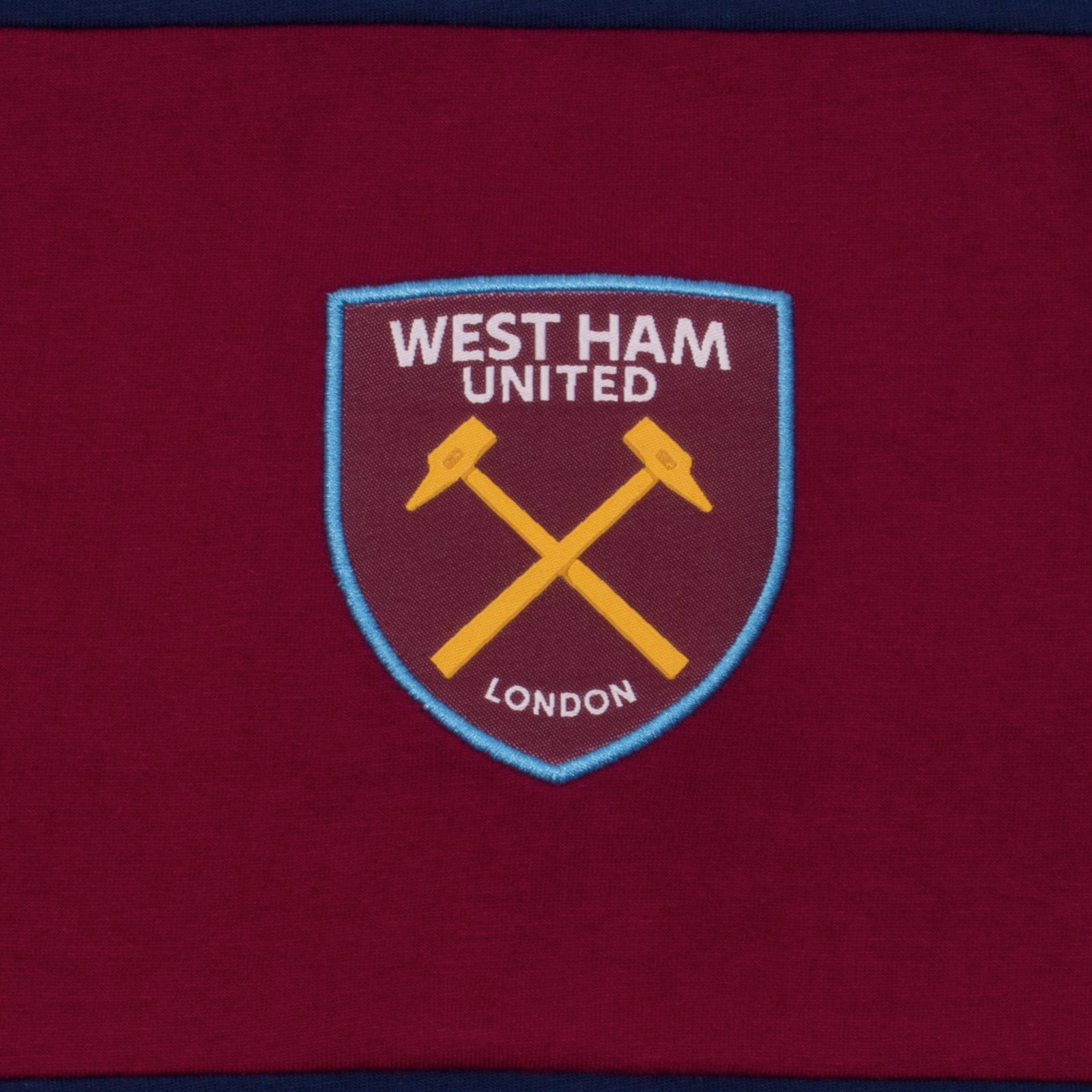 West Ham adults long pyjamas in navy blue. Long sleeved top with graphic print and long bottoms