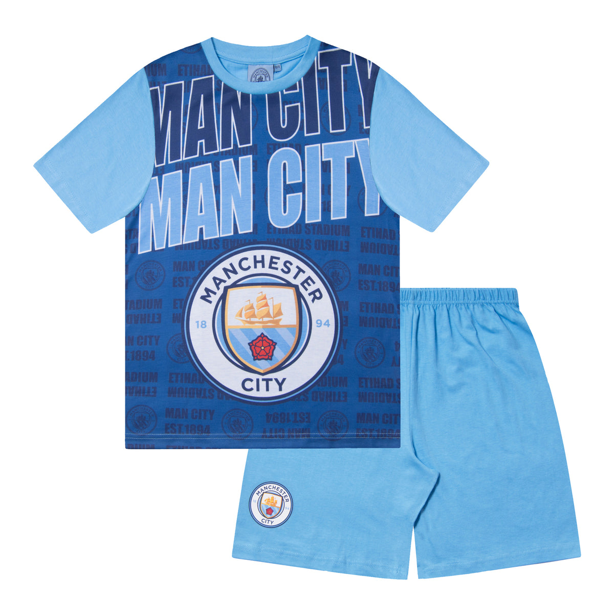 Man City kids pyjamas in navy blue. Short sleeve top with graphic and shorts with crest to the left leg