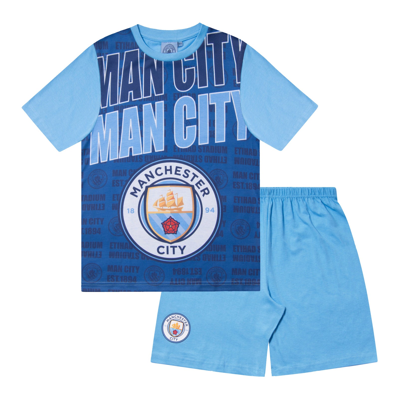 Man City kids pyjamas in navy blue. Short sleeve top with graphic and shorts with crest to the left leg