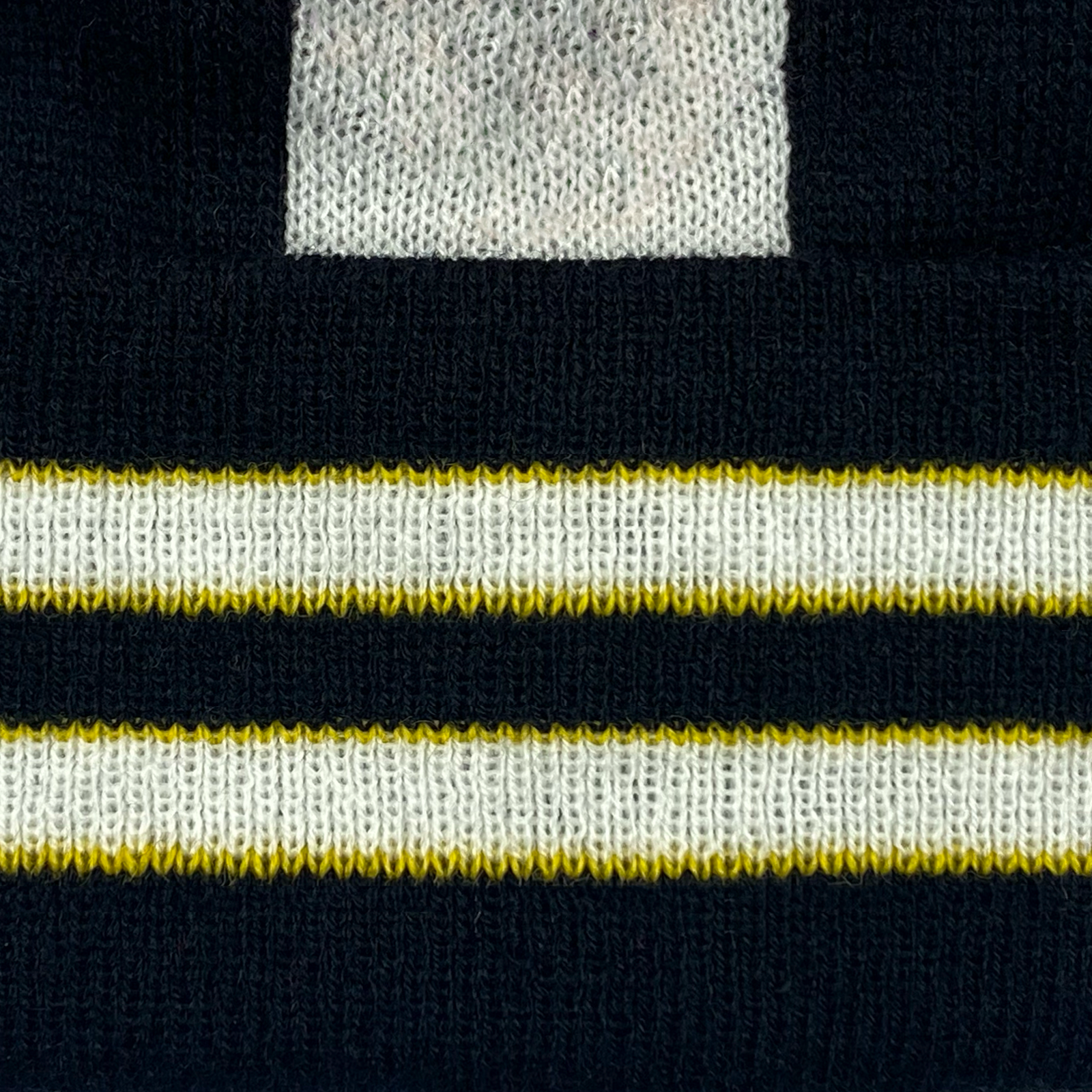 Newcastle Utd retro knitted bobble hat in black & white 1997 colours