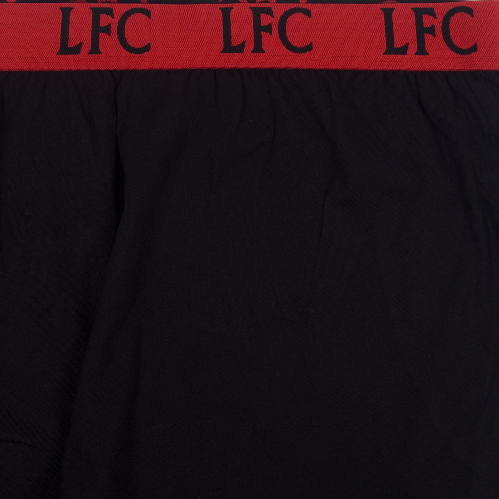 Liverpool adults pyjamas in black. Short sleeve top with graphic and shorts with logo to the left leg.