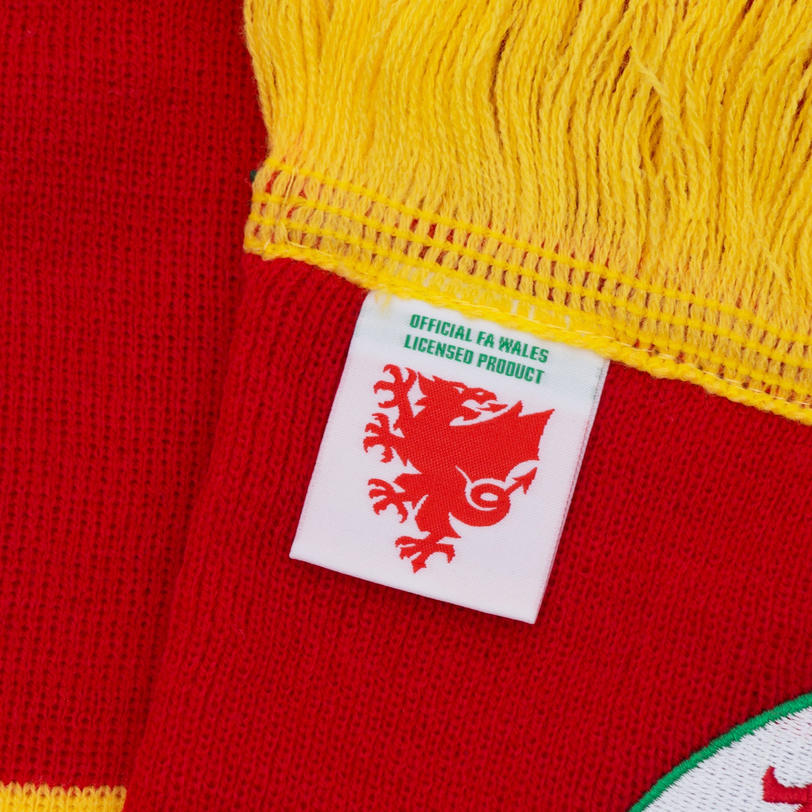 Official Wales FA retro bar scarf in red, yellow & green with Wales crest and fringe to each end