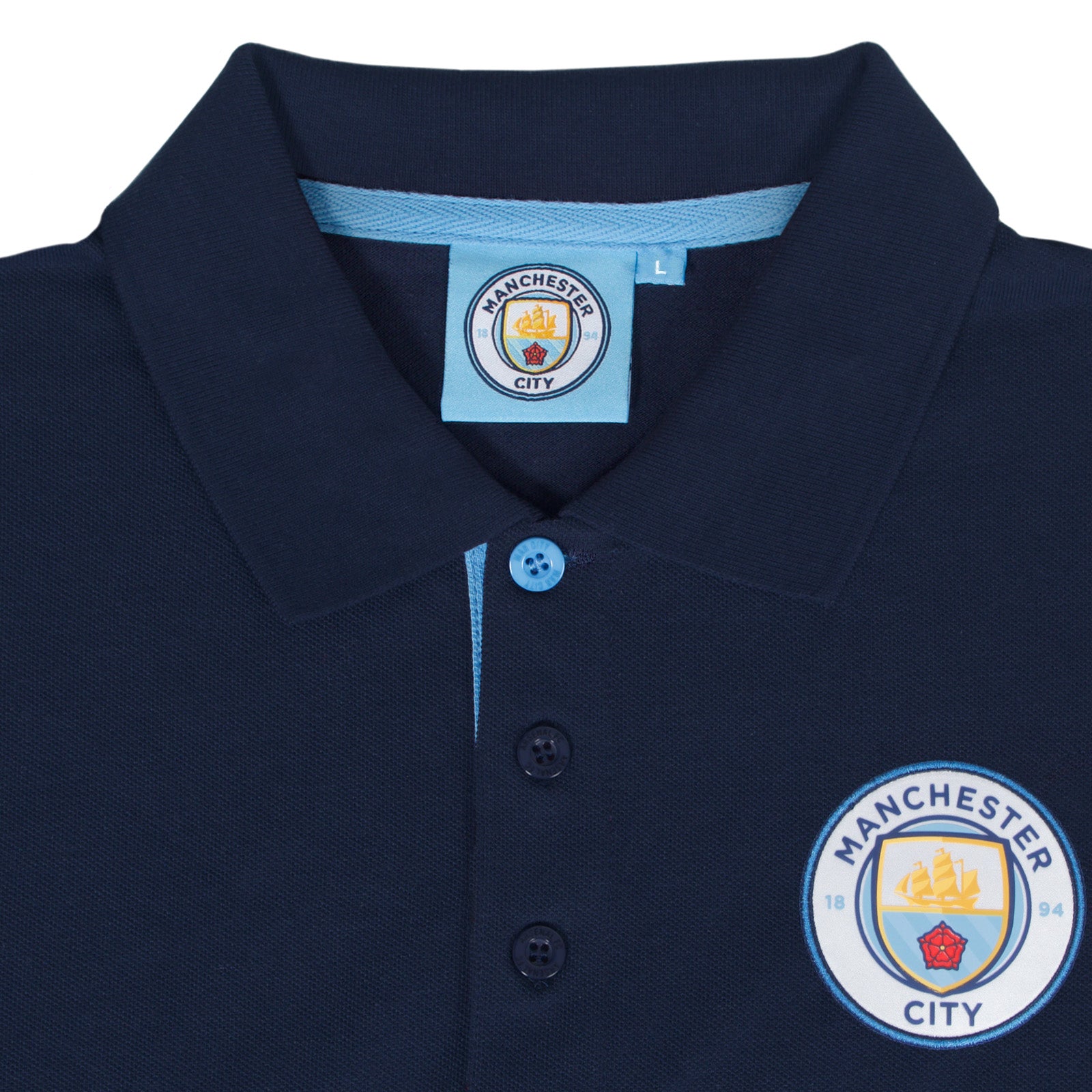 Man City adults polo shirt in navy blue with contrast sleeve and club crest to the chest.